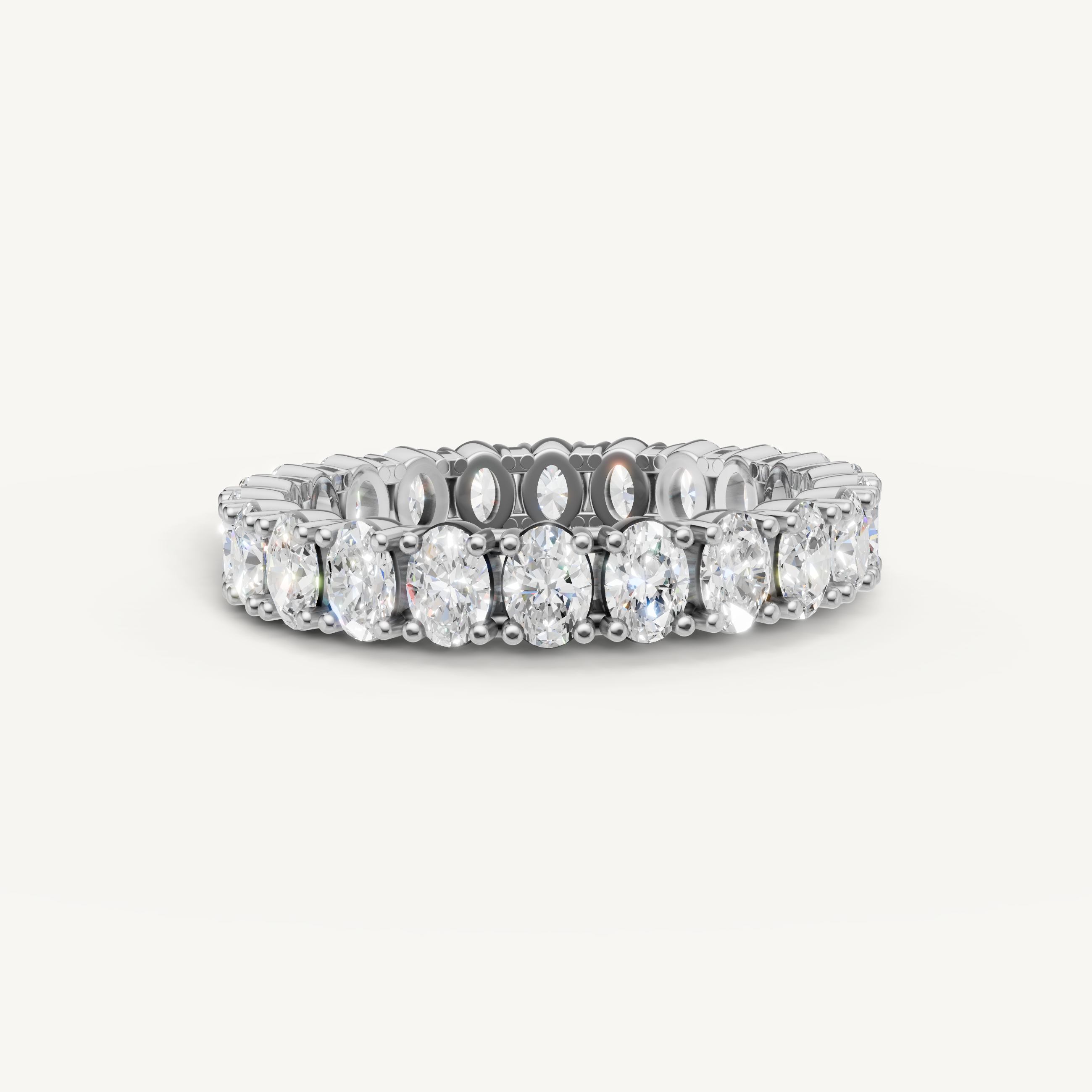 Raul Diamonds white gold oval diamond eternity wedding band with shared prong setting