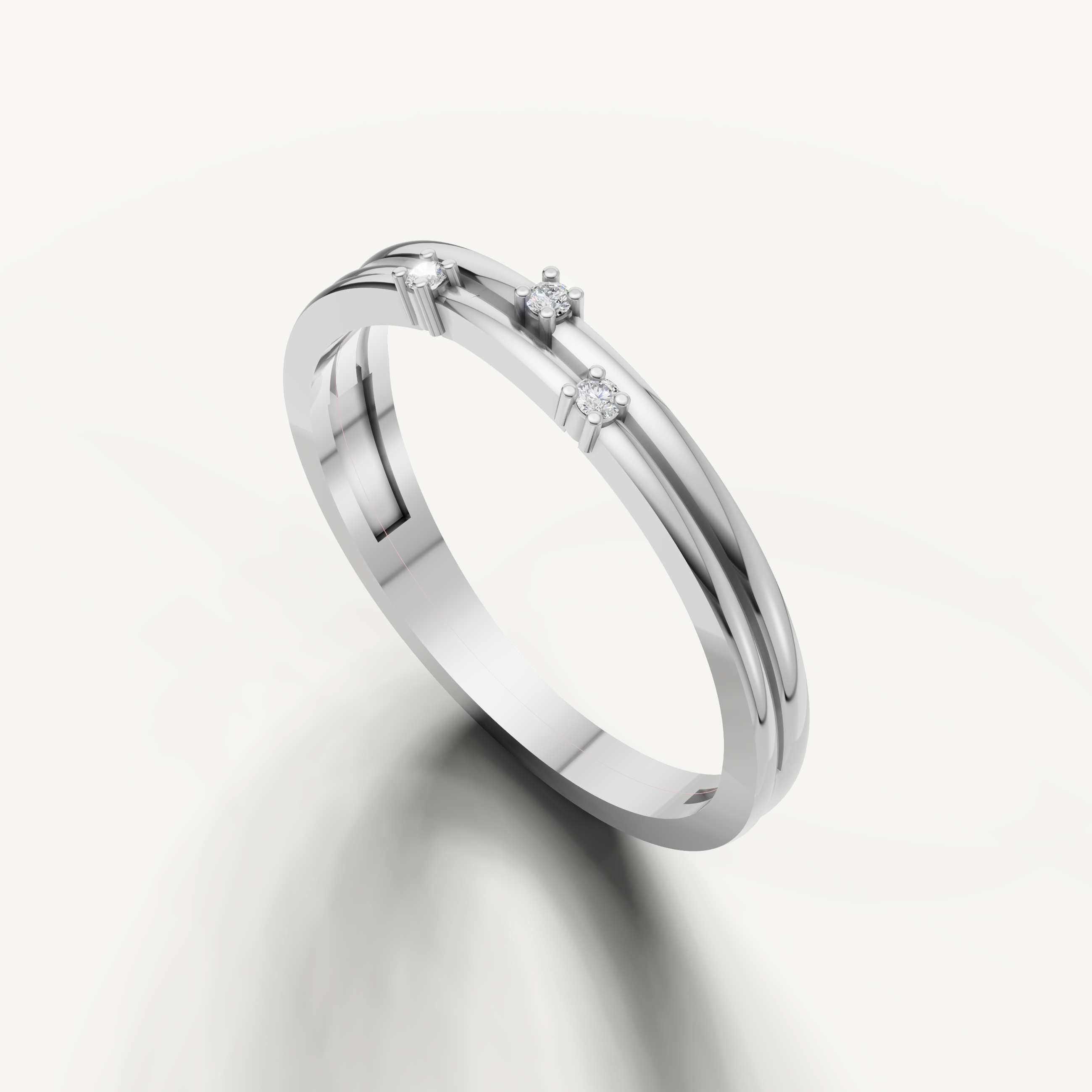 Delicate white gold diamond wedding band featuring round diamonds by Raul Diamonds
