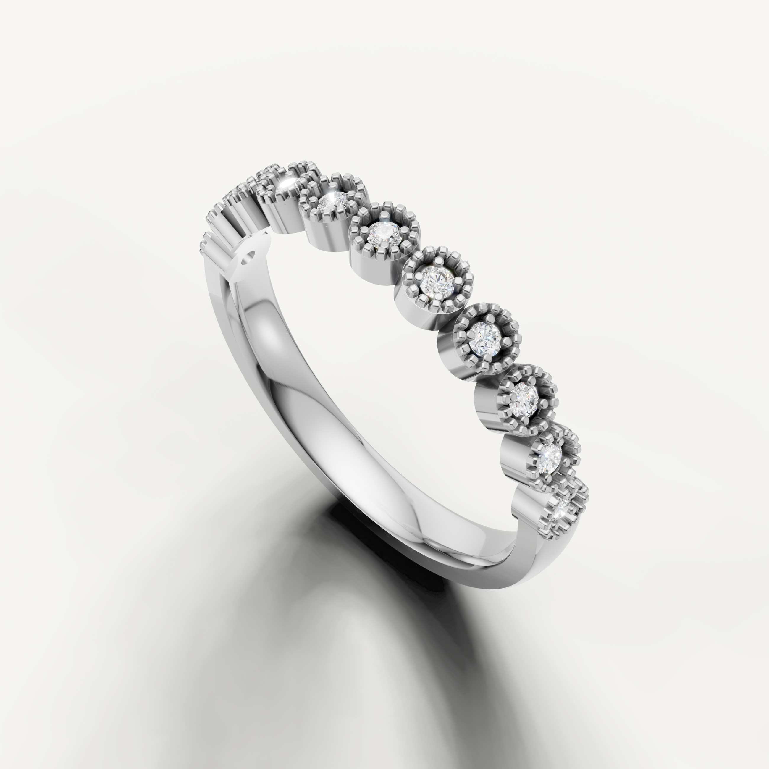 Elegant white gold milgrain diamond wedding band featuring round brilliant stones by Raul Diamonds
