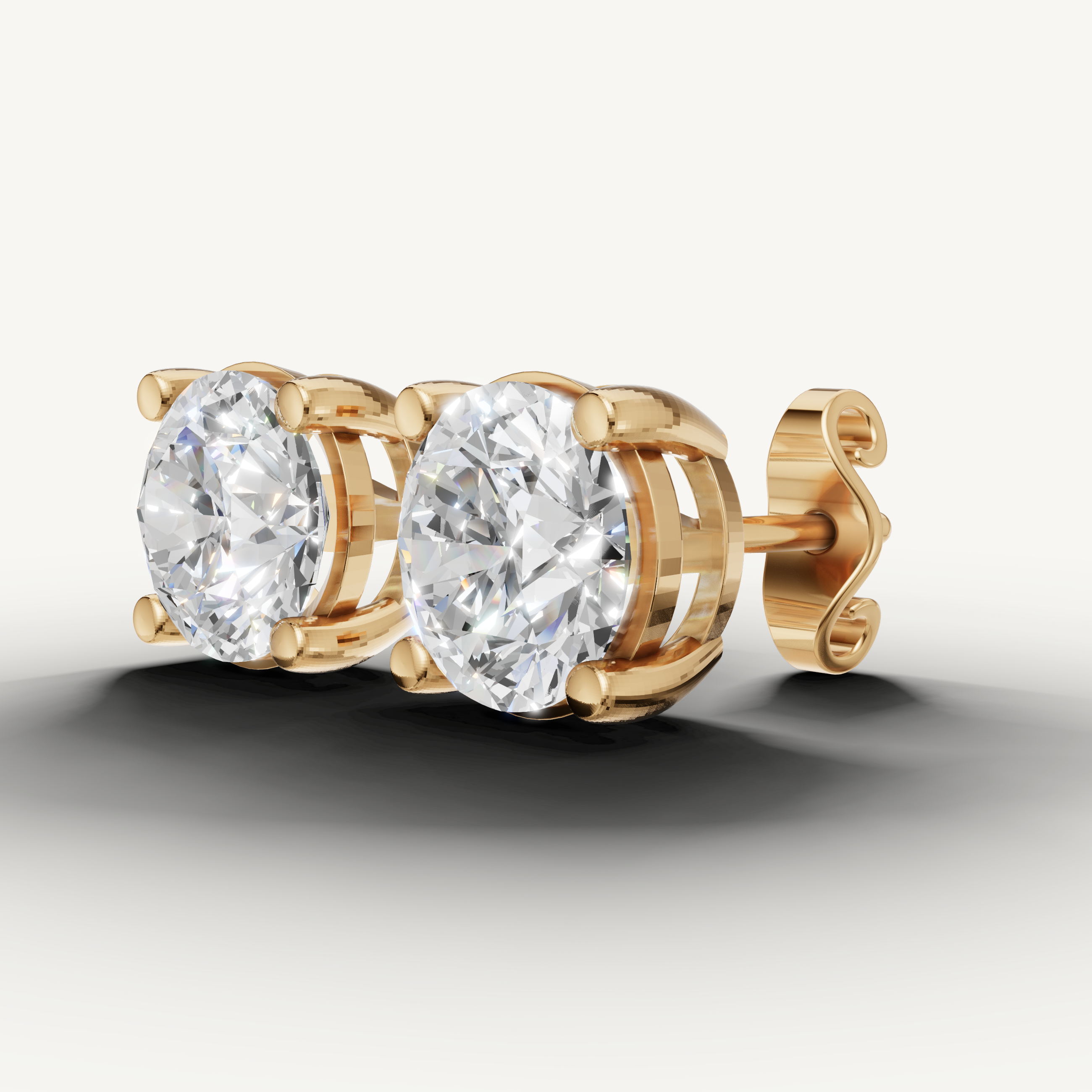 Raul Diamonds yellow gold round cut diamond stud earrings with refined fine jewelry craftsmanship