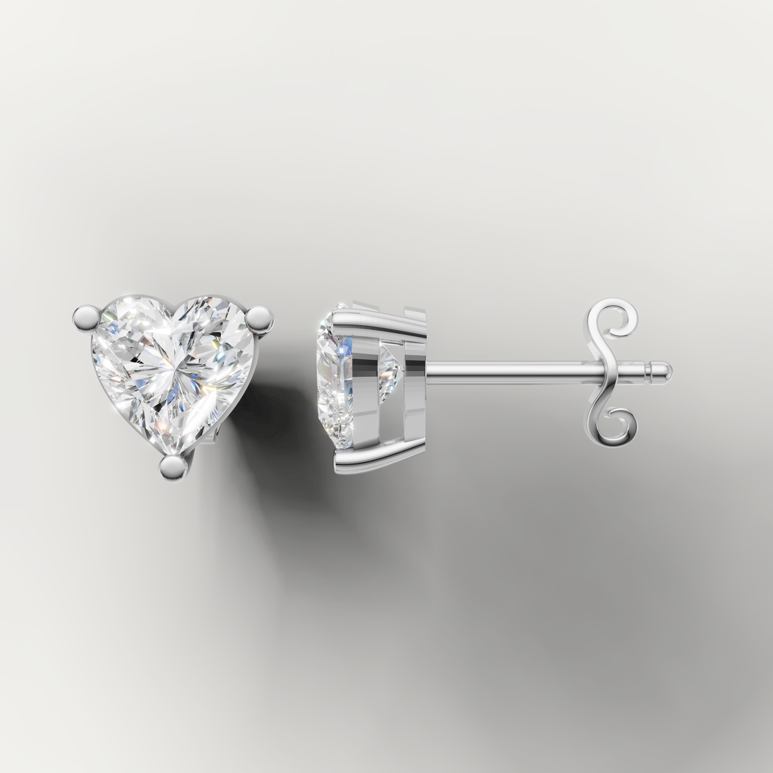 White gold heart shape diamond earrings by Raul Diamonds featuring timeless romantic elegance