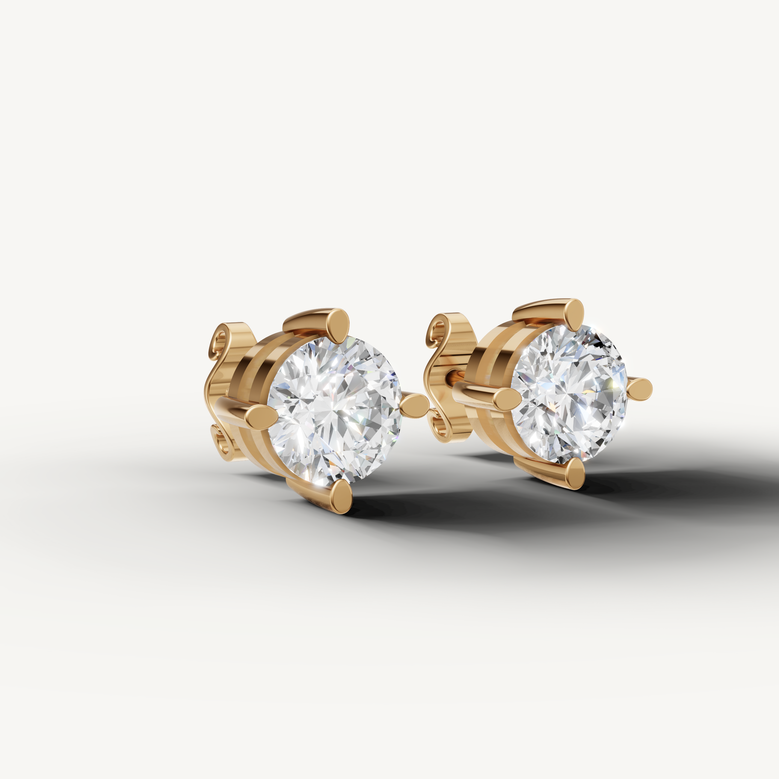 Luxury yellow gold round cut diamond earrings for women with classic fine jewelry styling by Raul Diamonds
