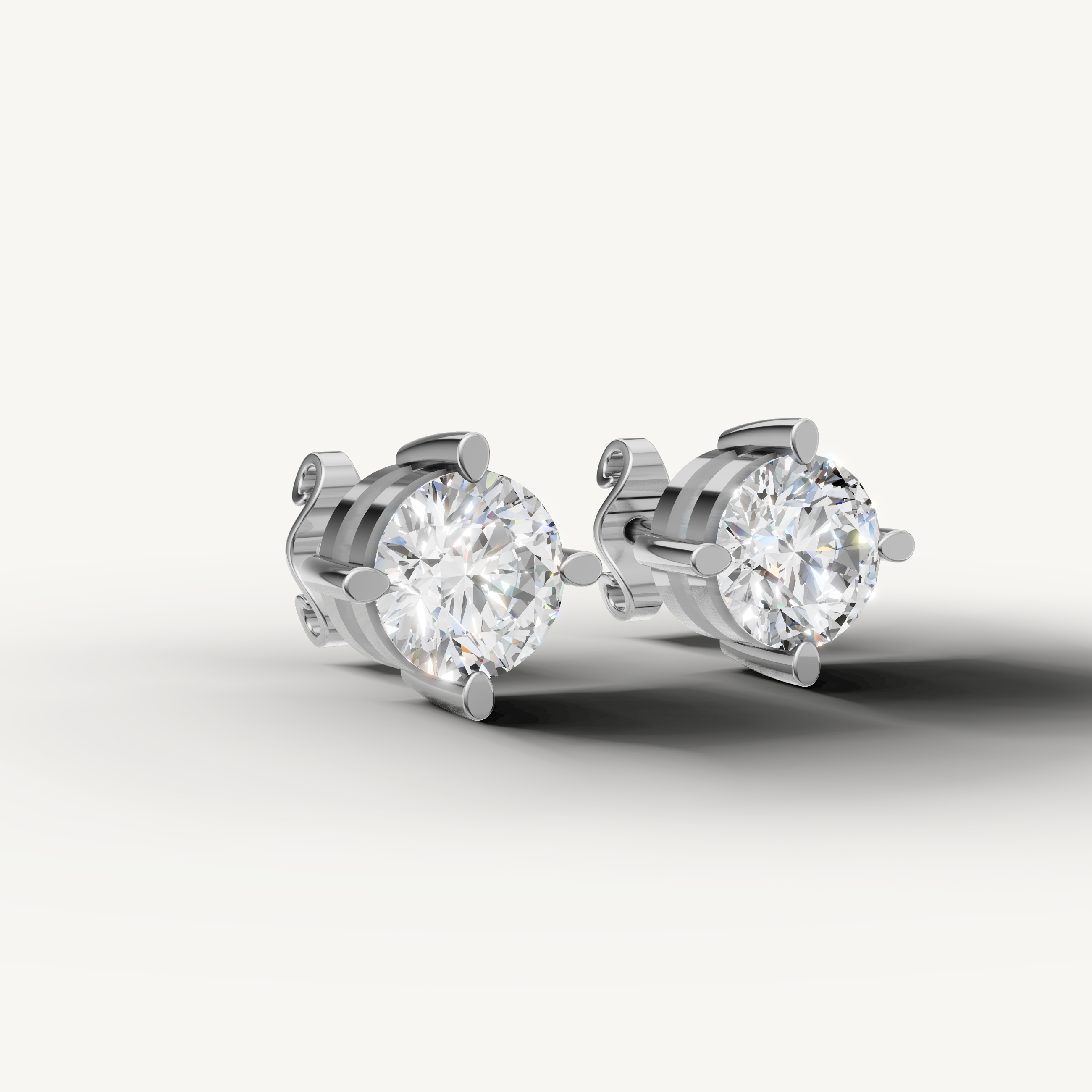 Luxury white gold round cut diamond earrings for women with elegant fine jewelry craftsmanship by Raul Diamonds