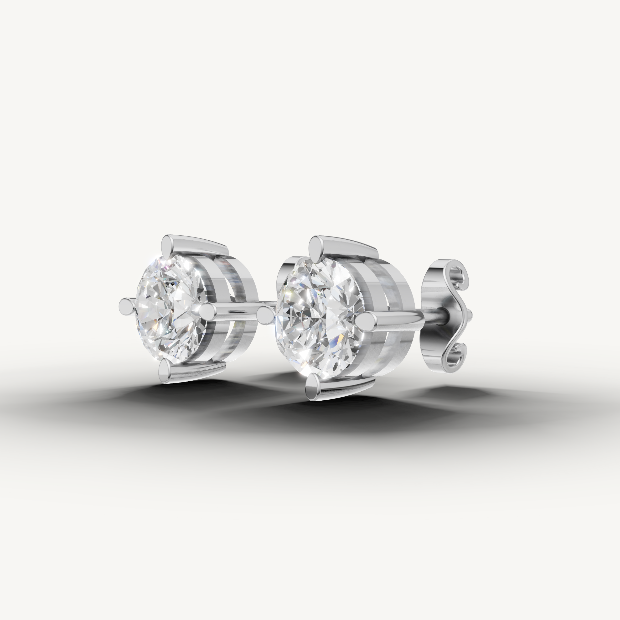 Raul Diamonds white gold four prong diamond stud earrings with sparkling solitaire diamonds