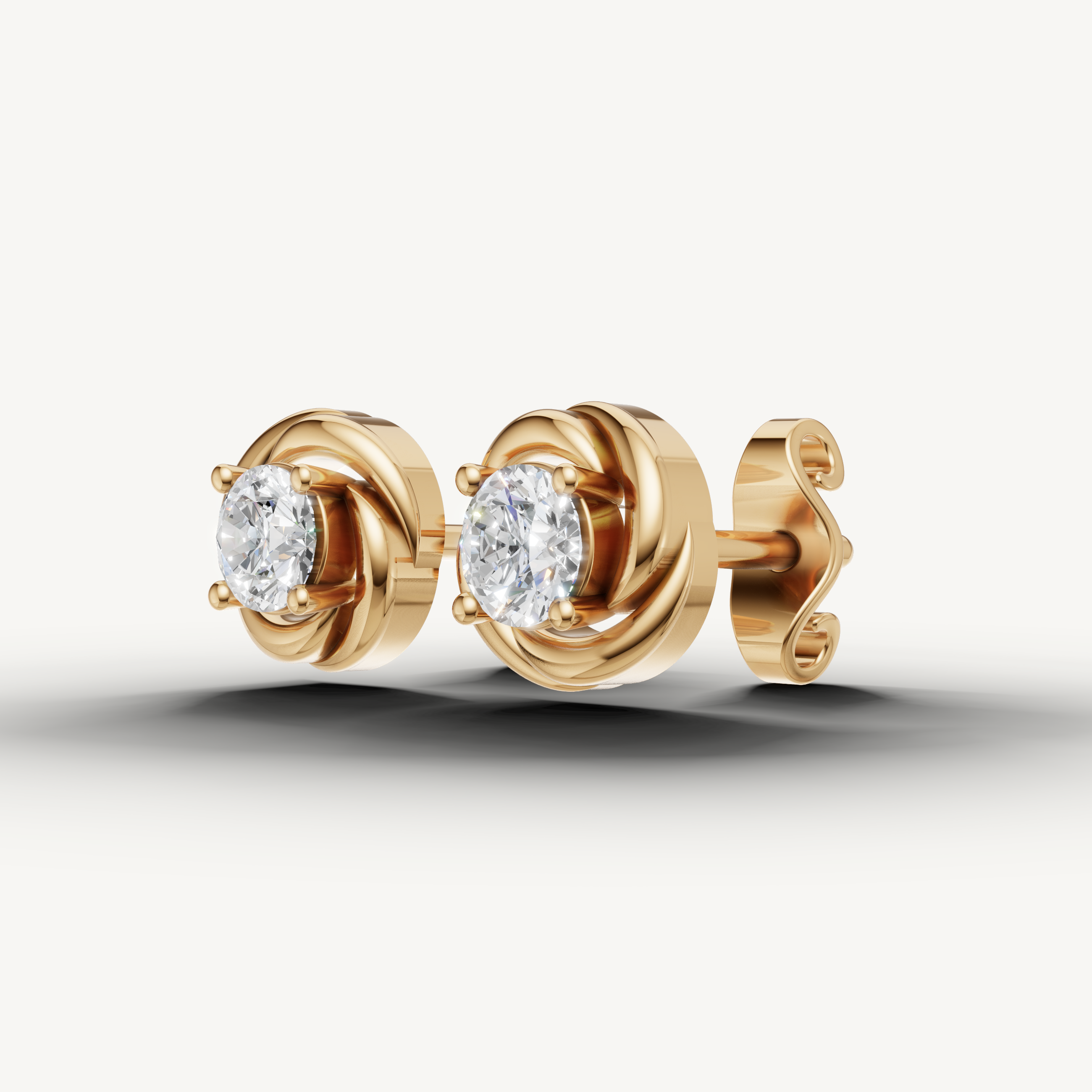 Raul Diamonds yellow gold circular swirl diamond earrings with timeless fine jewelry craftsmanship
