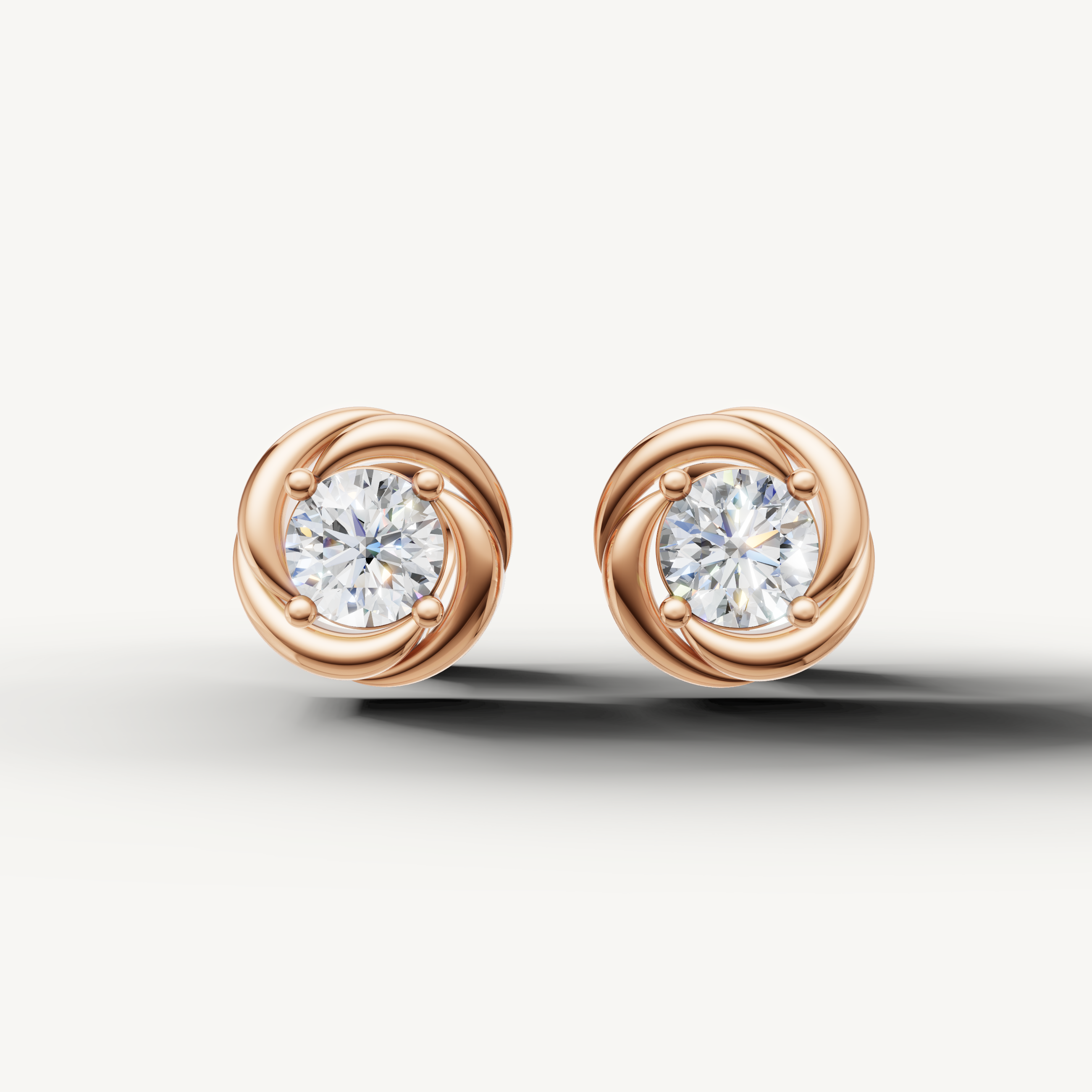 Raul Diamonds rose gold swirl halo diamond stud earrings with brilliant round center diamonds
