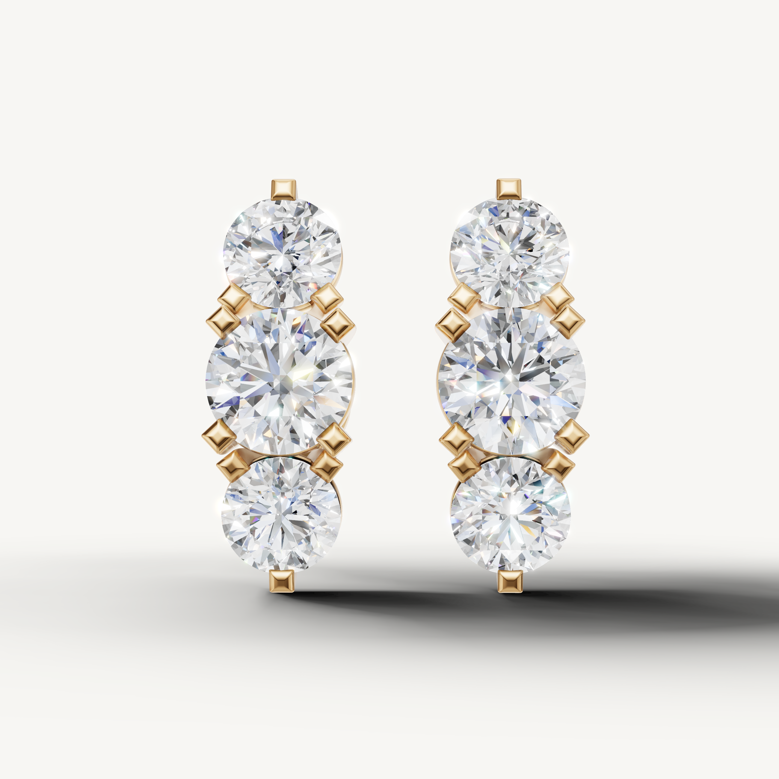 Raul Diamonds yellow gold round diamond drop earrings with timeless luxury sparkle