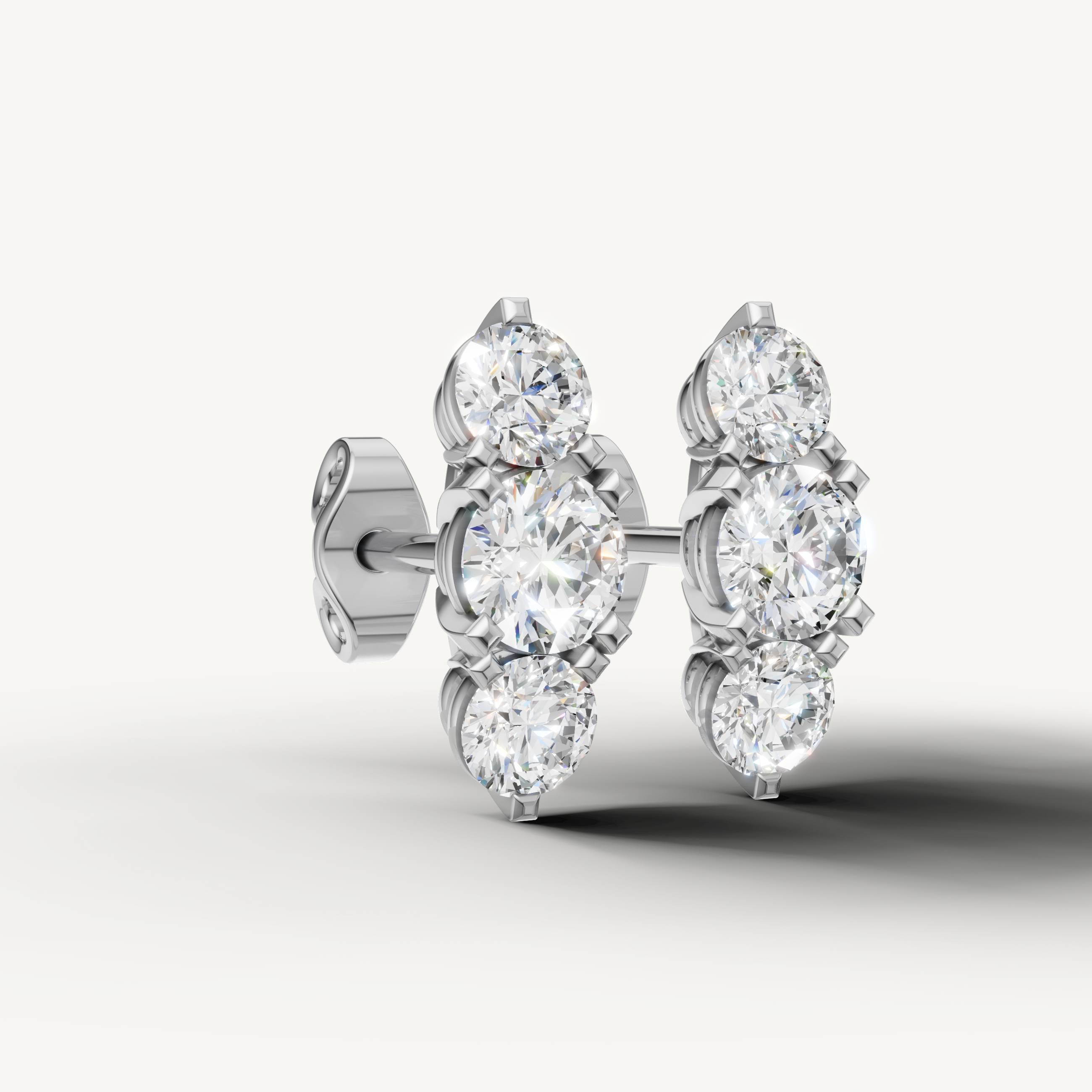 Raul Diamonds white gold round cut diamond drop earrings for luxury jewelry lovers