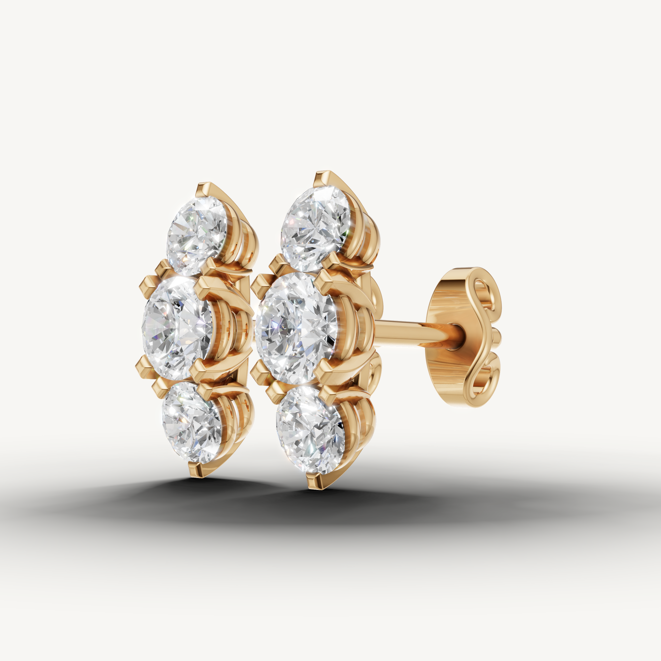 Elegant yellow gold multi stone diamond earrings with modern sophistication by Raul Diamonds