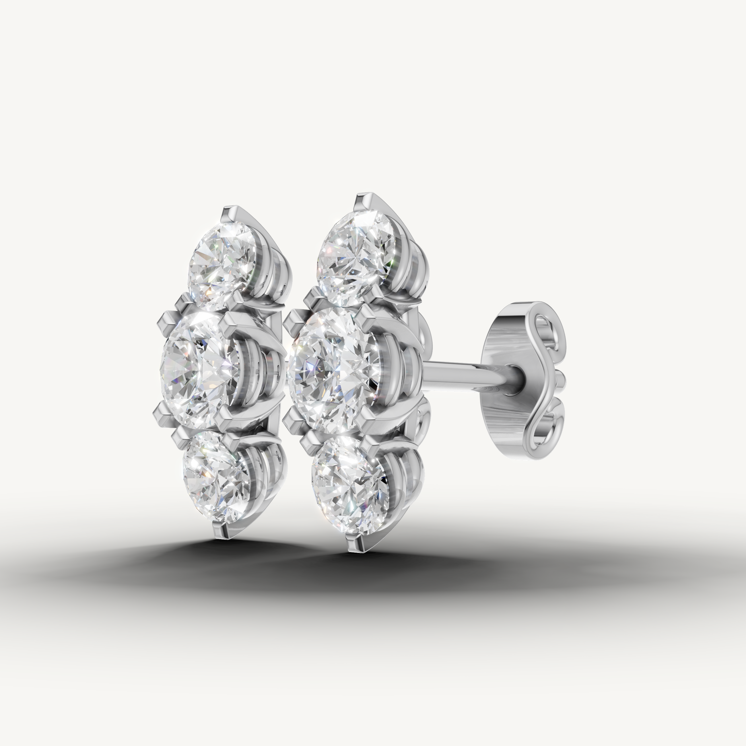 Elegant white gold multi stone diamond earrings with radiant brilliance by Raul Diamonds