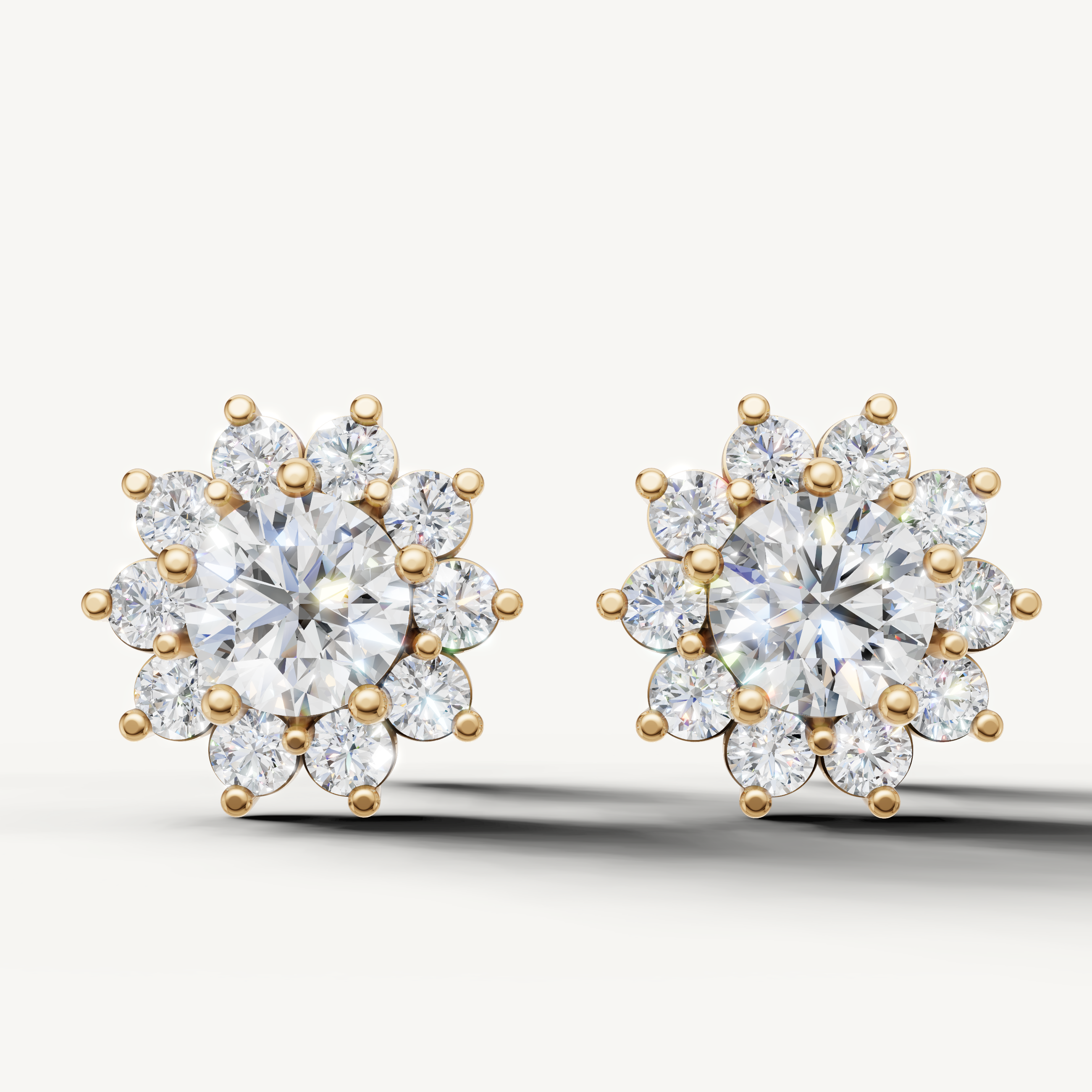 Floral halo lab grown diamond stud earrings in 14K yellow gold by Raul Diamonds