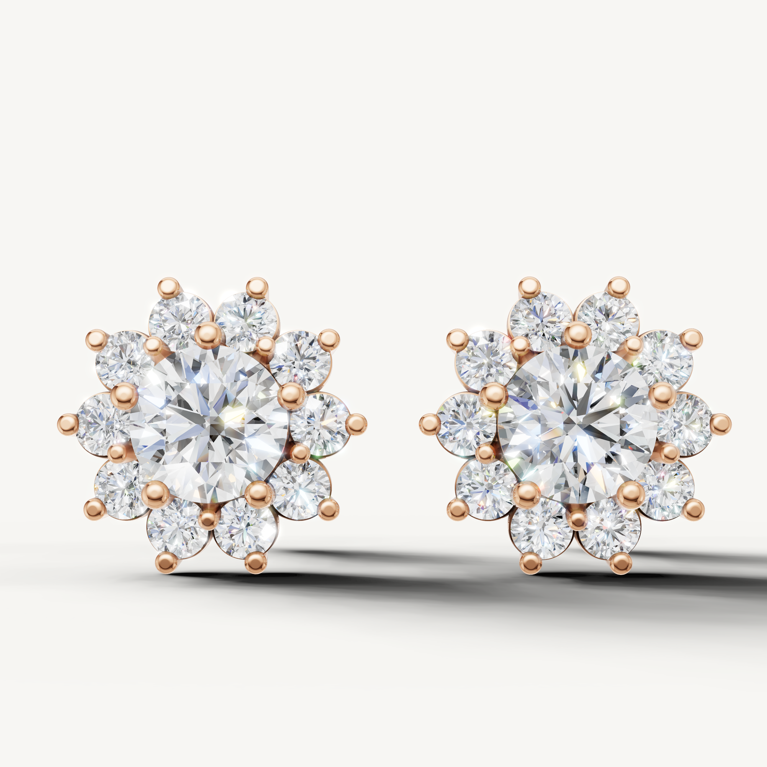 Floral halo lab grown diamond stud earrings in 14K rose gold by Raul Diamonds