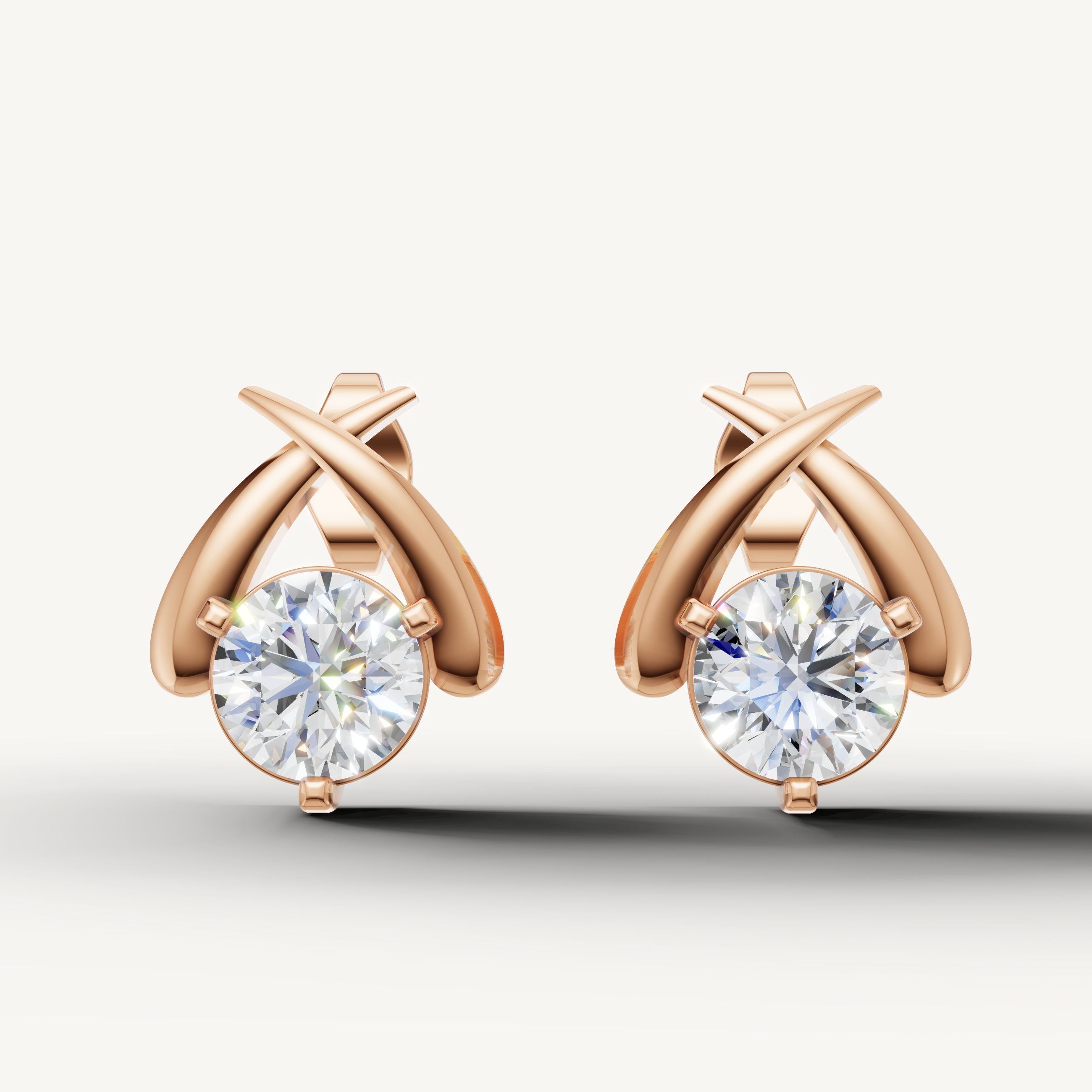Rose gold round diamond crossover earrings by Raul Diamonds with luxury sparkle
