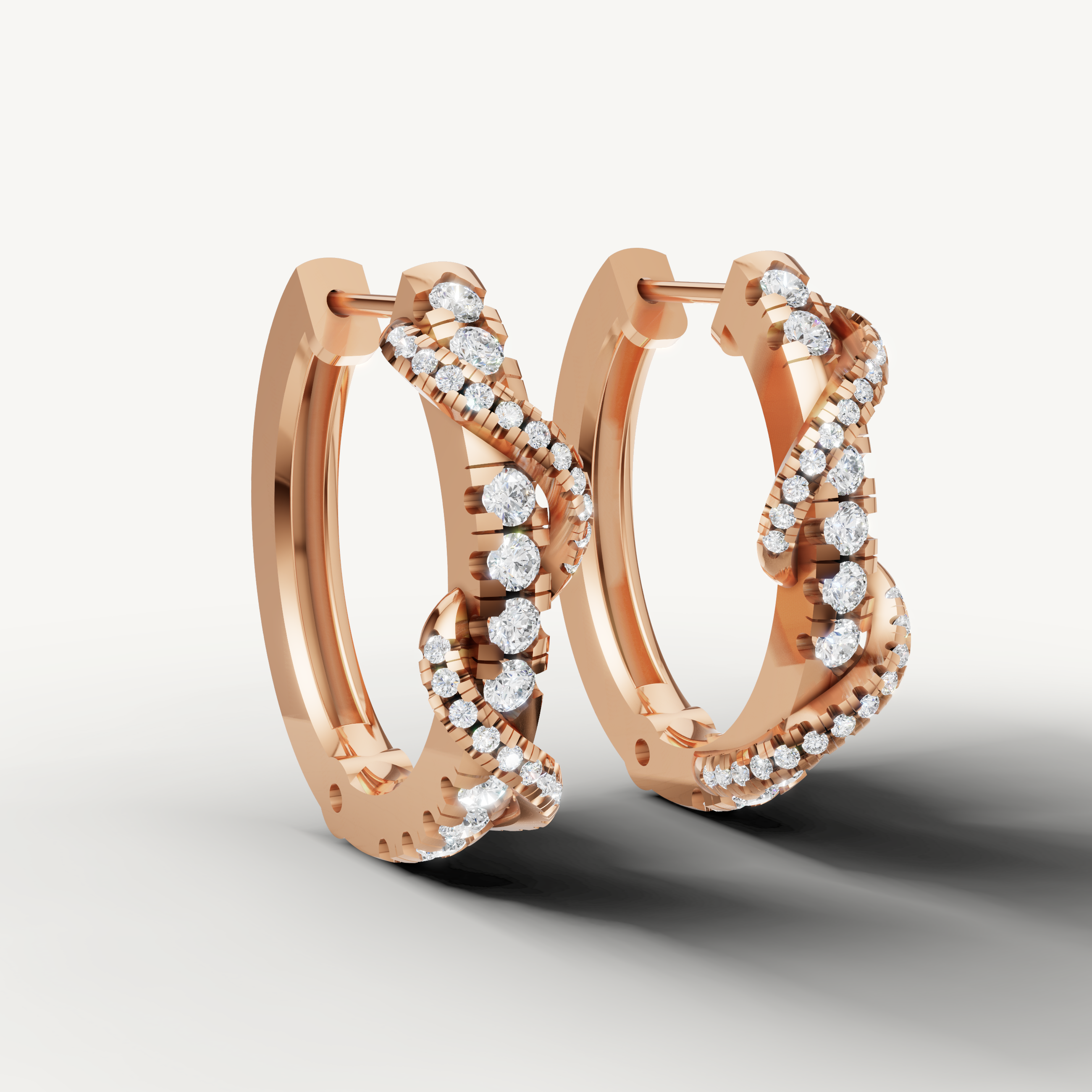 Rose gold diamond swirl hoop earrings by Raul Diamonds with luxury sparkle