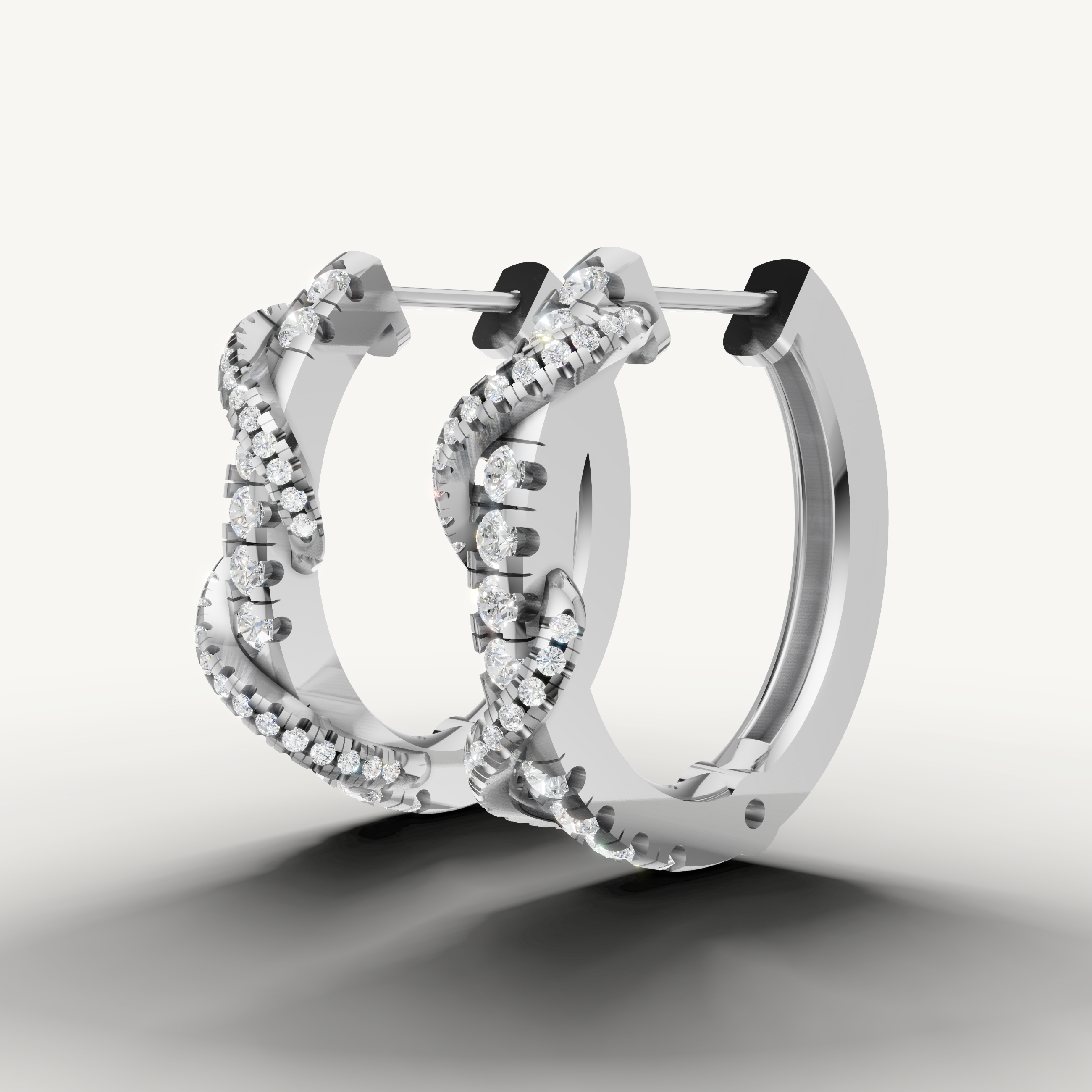 Elegant white gold pavé diamond hoop earrings with radiant brilliance by Raul Diamonds