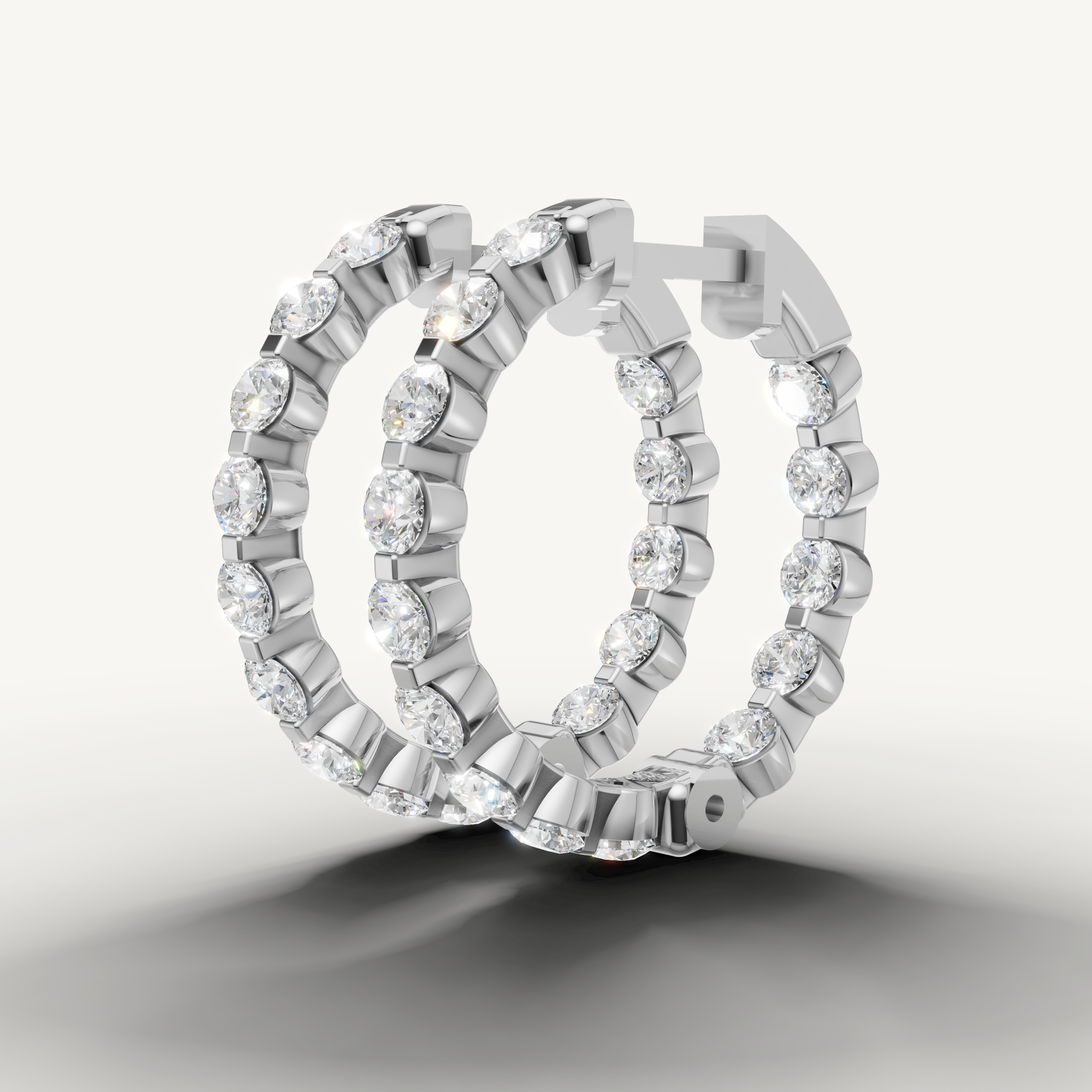 Elegant white gold diamond hoop earrings with radiant brilliance by Raul Diamonds