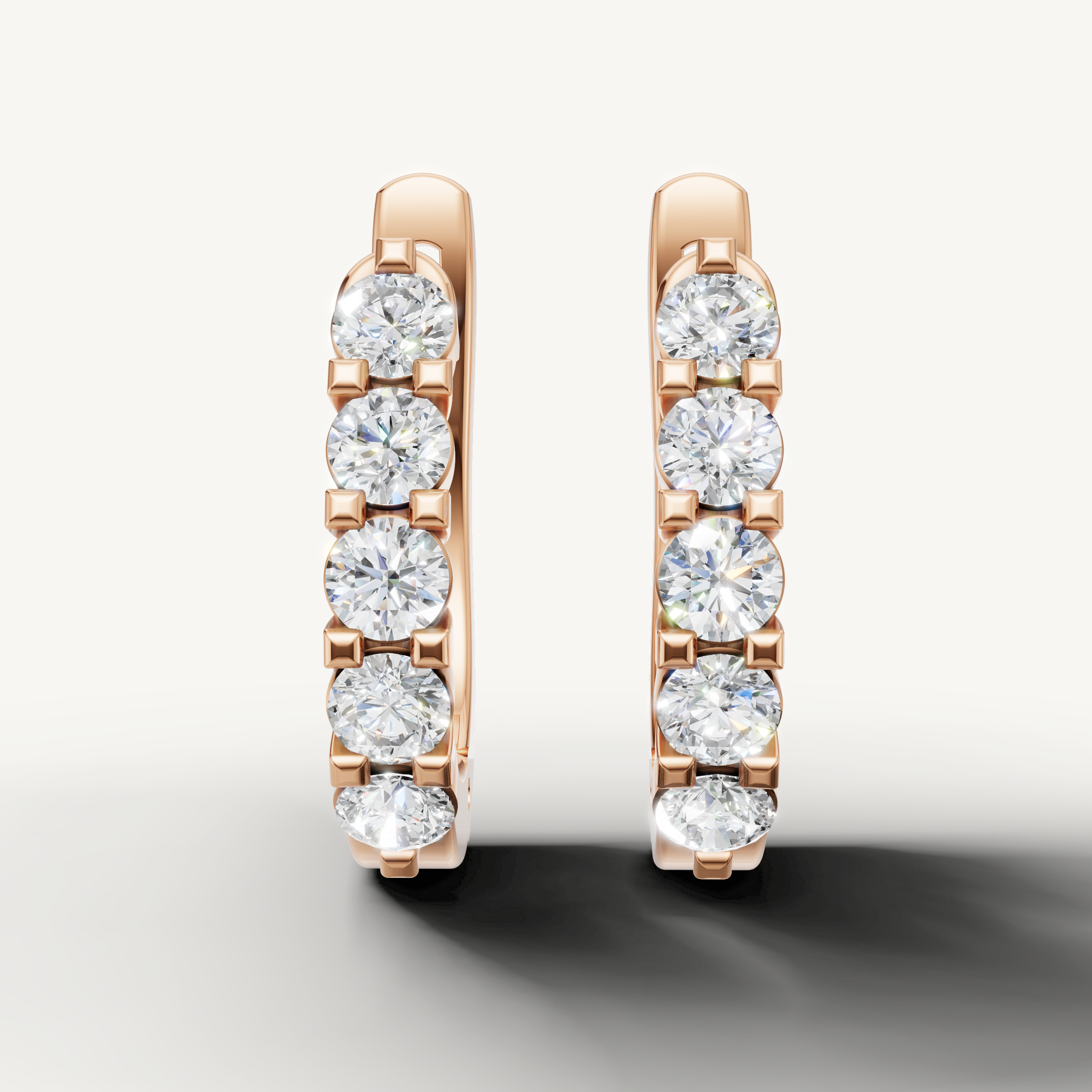 Raul Diamonds rose gold diamond hoop earrings with round brilliant diamond design
