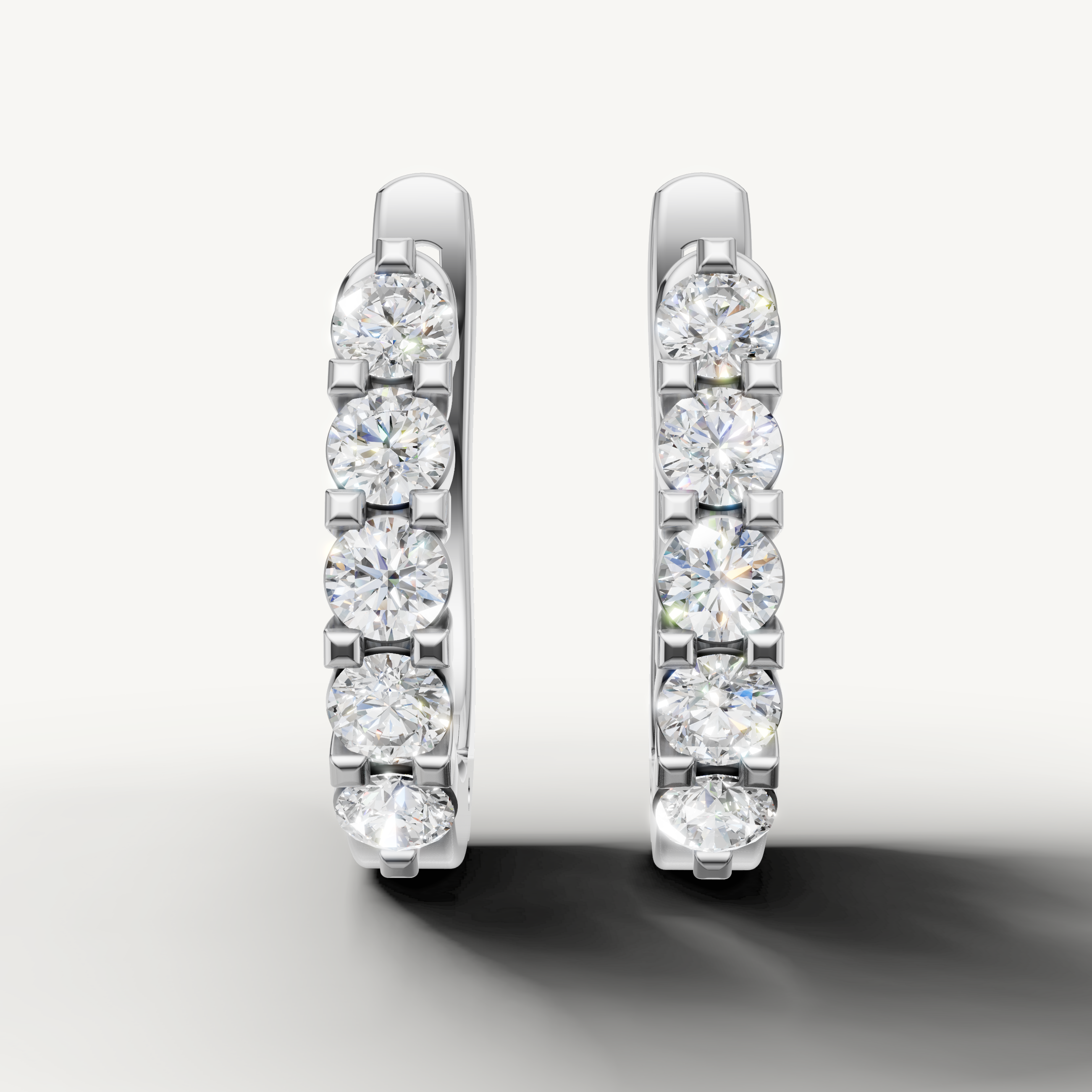 Raul Diamonds white gold diamond hoop earrings with round brilliant diamonds