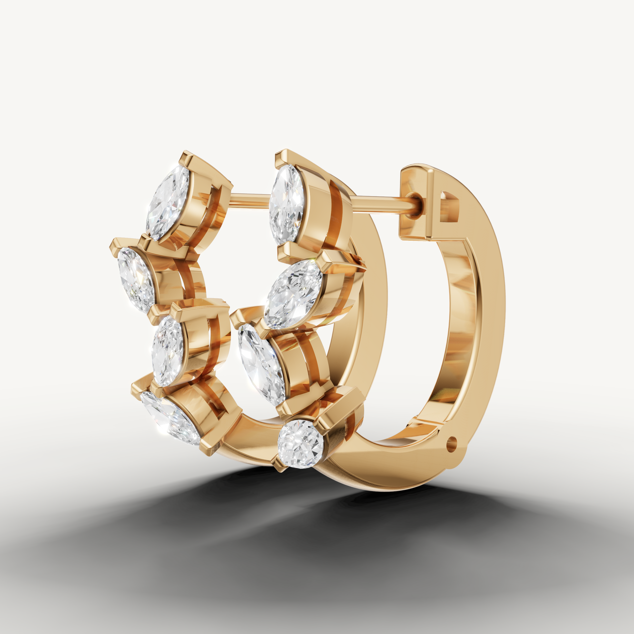 Raul Diamonds yellow gold diamond hoop earrings inspired by floral elegance