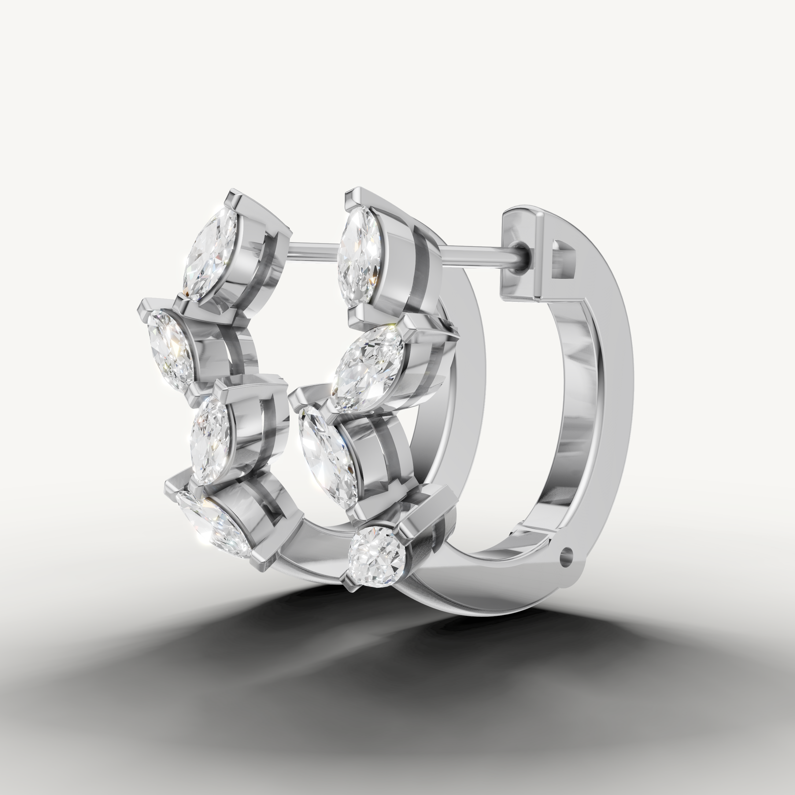 Raul Diamonds white gold diamond hoop earrings inspired by floral leaf design