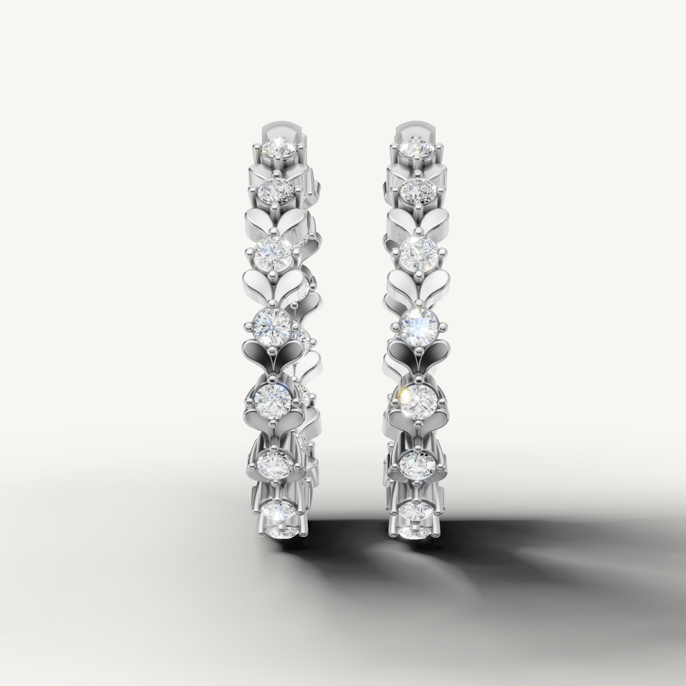 Raul Diamonds white gold floral diamond hoop earrings with round diamonds