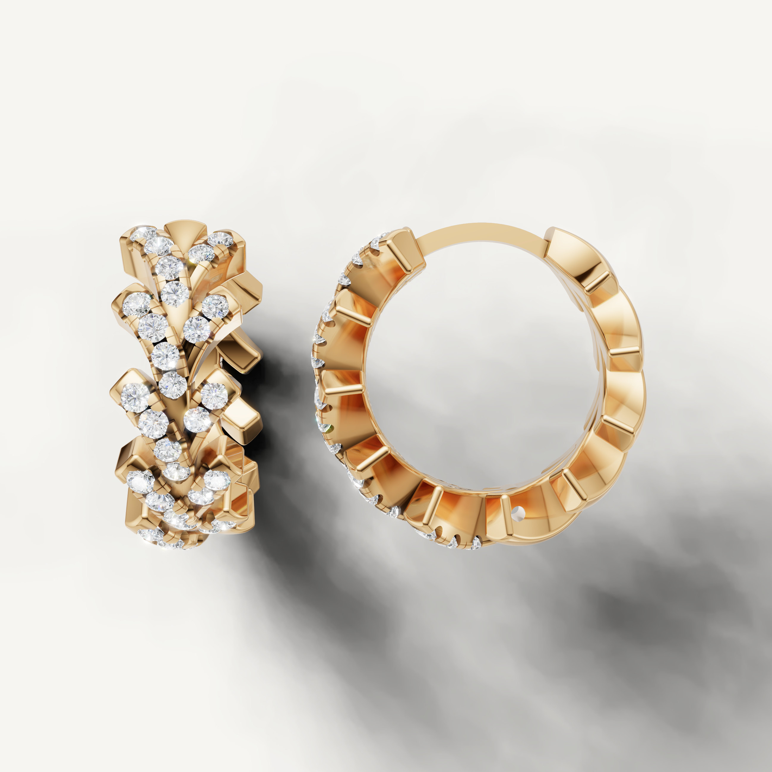 Luxury yellow gold designer earrings with sparkling diamond pave detailing by Raul Diamonds