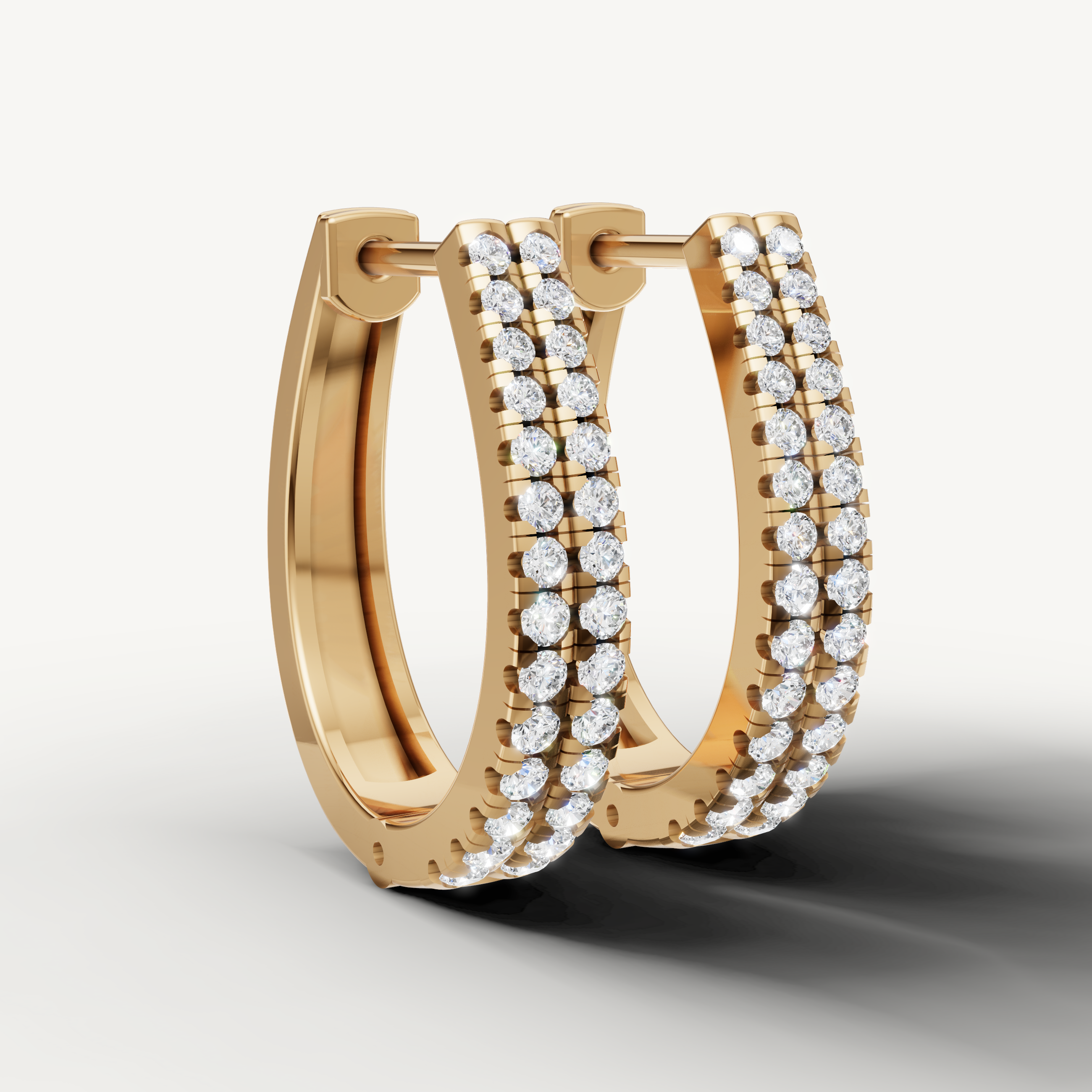 Elegant yellow gold diamond huggie earrings with modern double line design