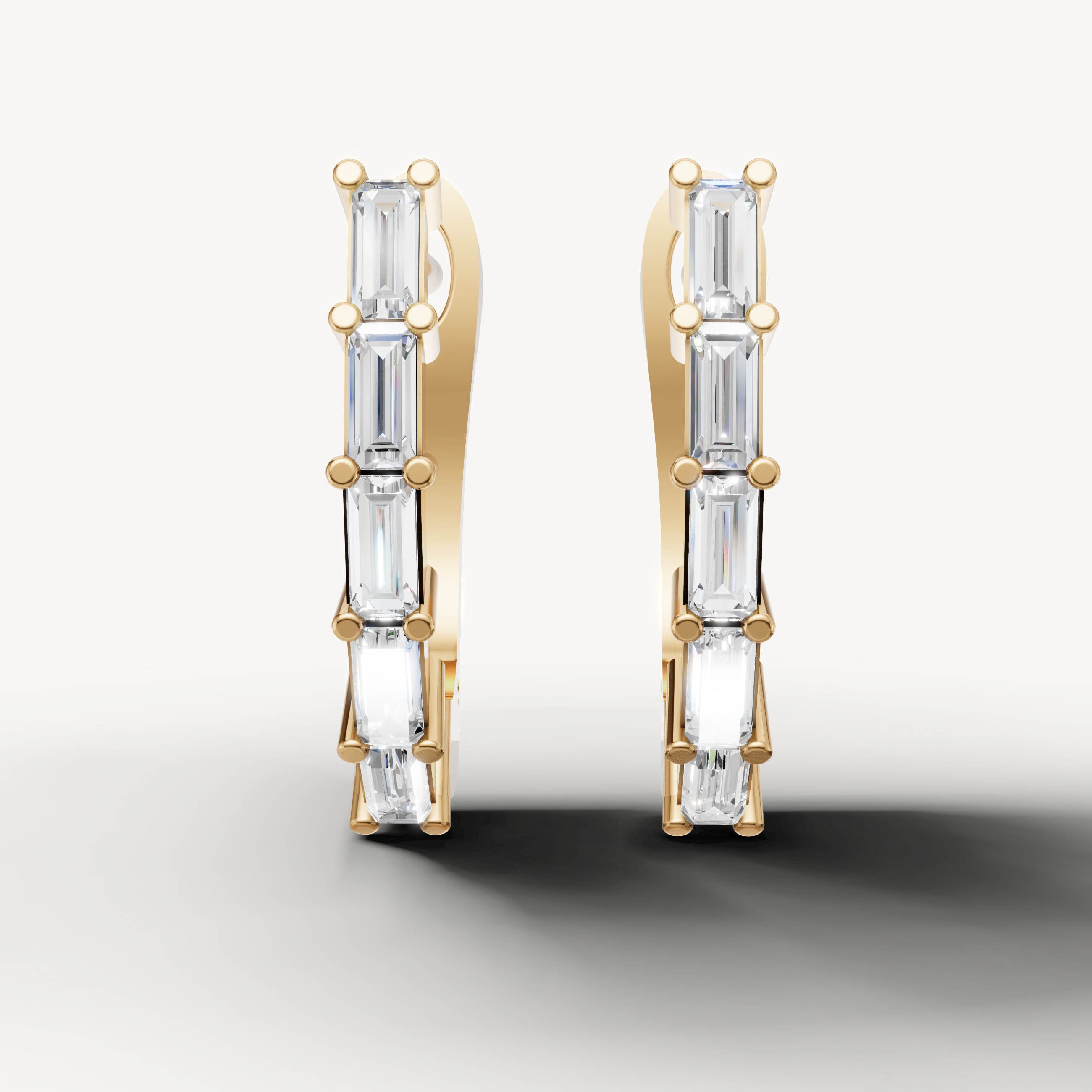 Raul Diamonds yellow gold baguette diamond hoop earrings with modern vertical design