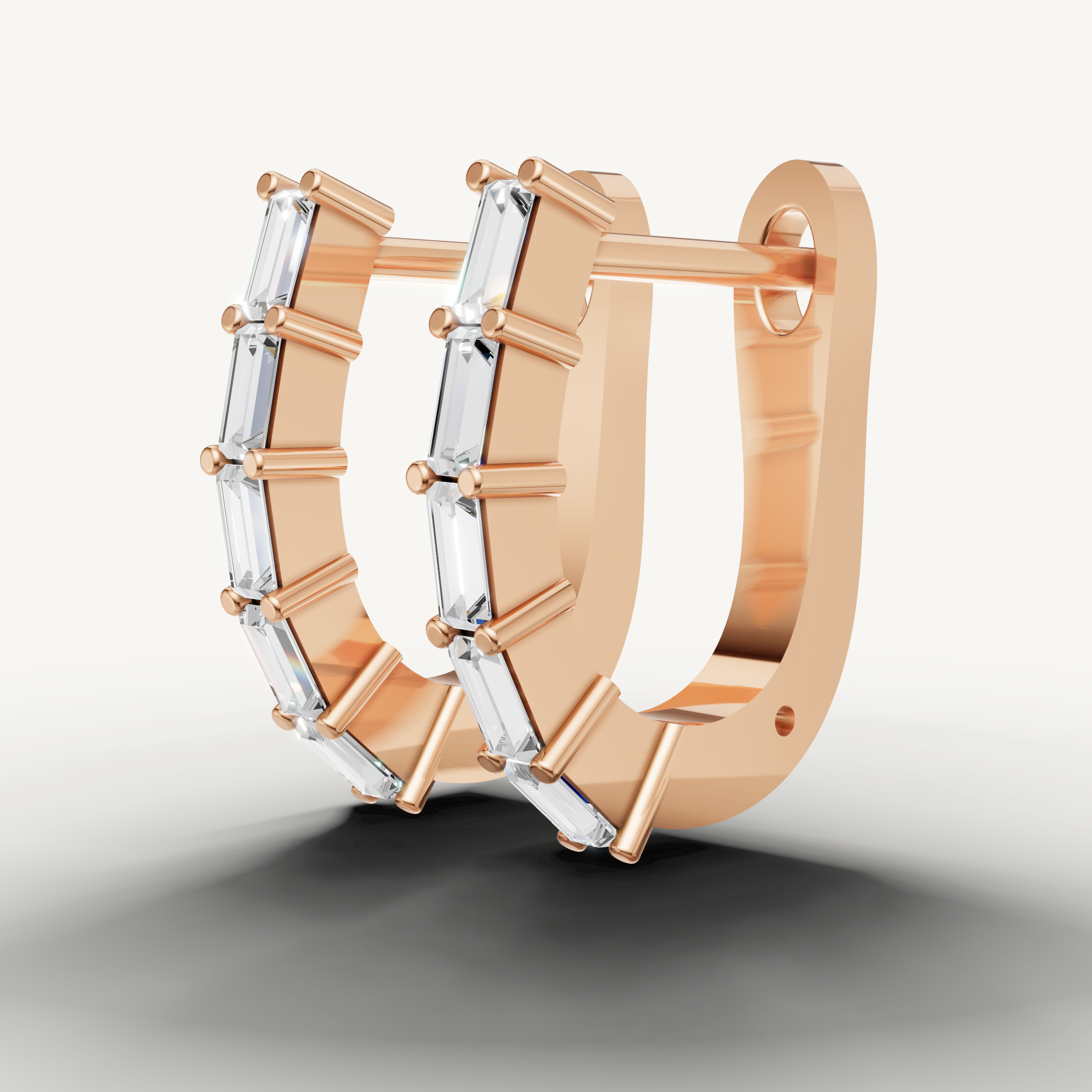 Elegant rose gold hoop earrings with sparkling baguette cut stones for women