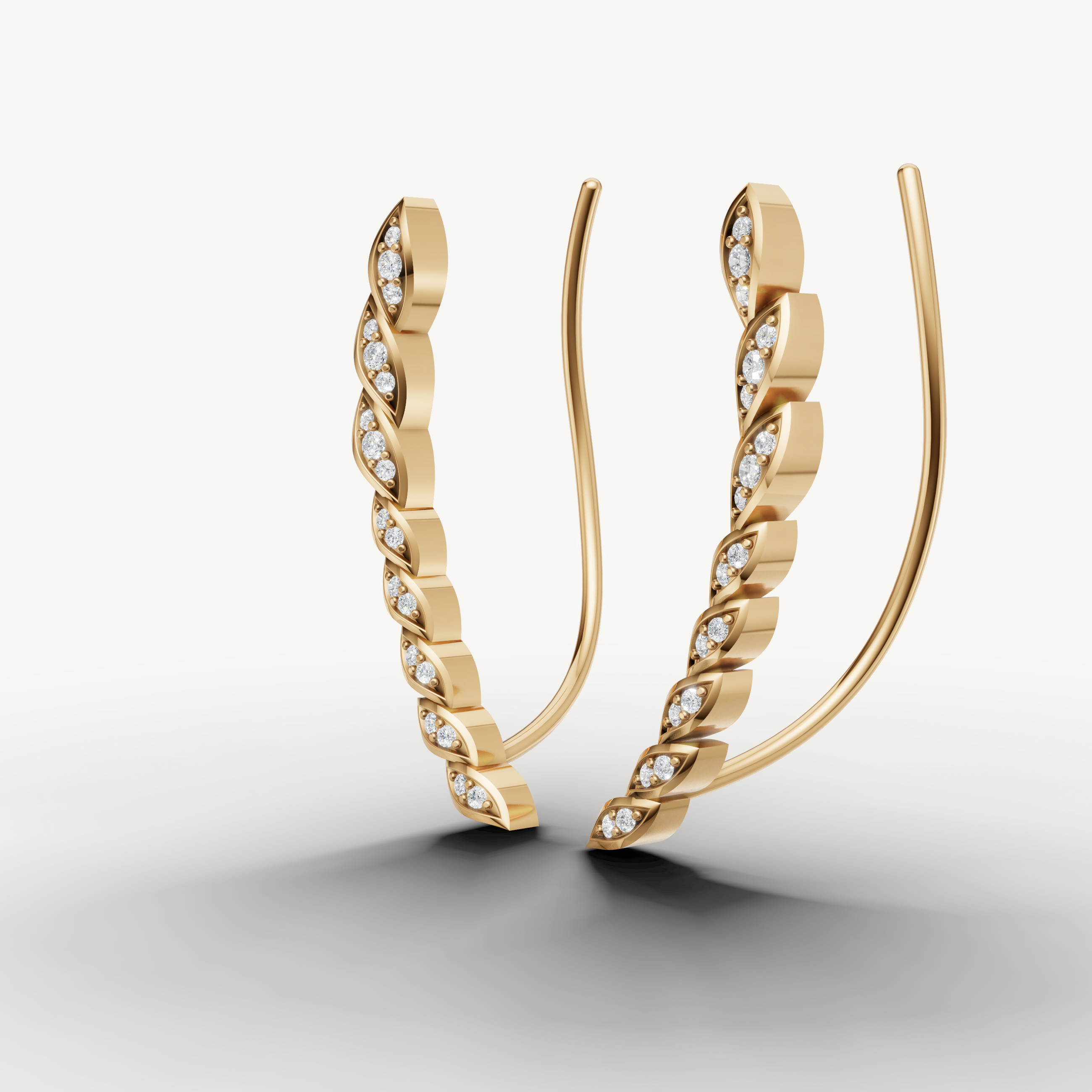 Fine jewelry yellow gold curved diamond earrings Raul Diamonds