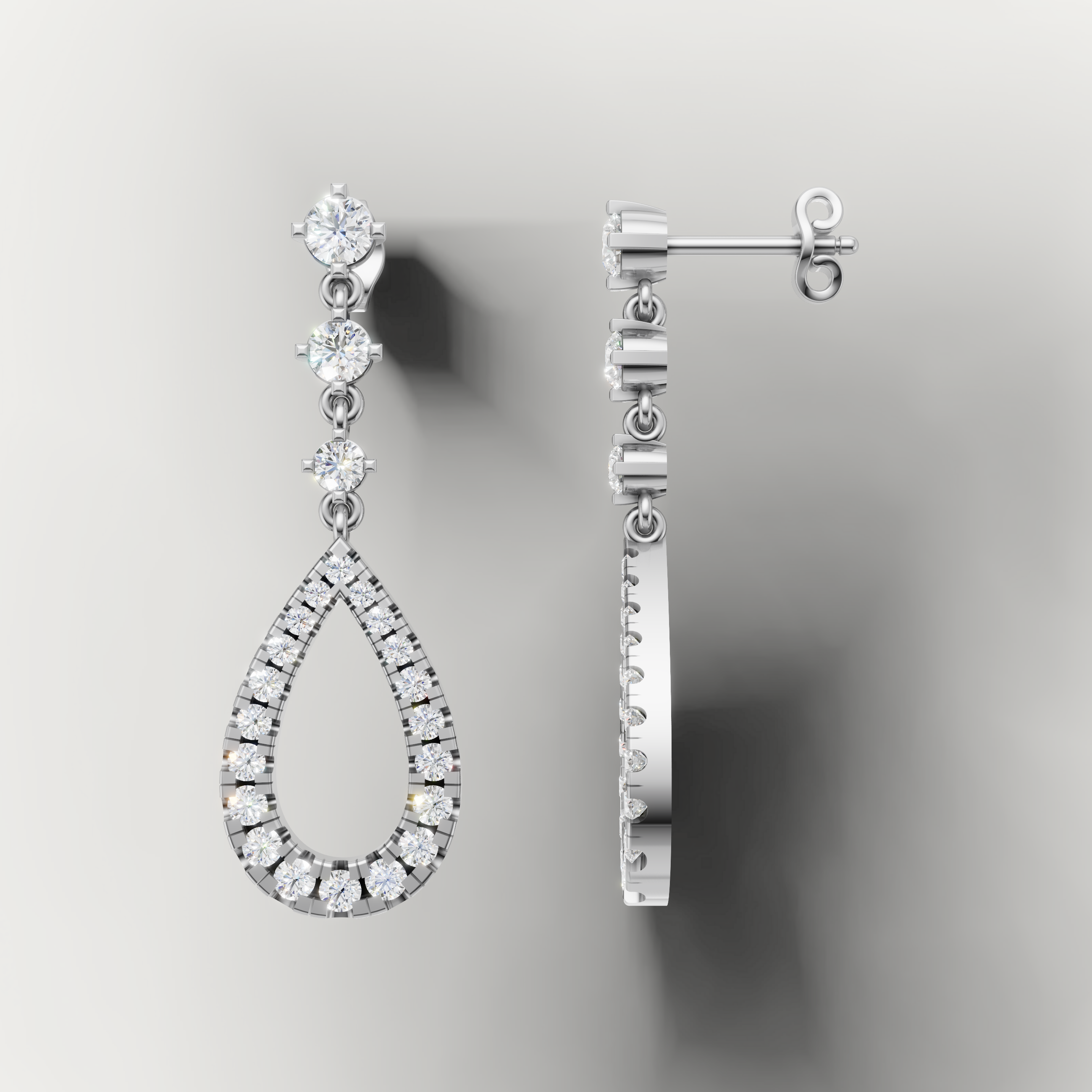 Elegant white gold pear shape diamond drop earrings Raul Diamonds