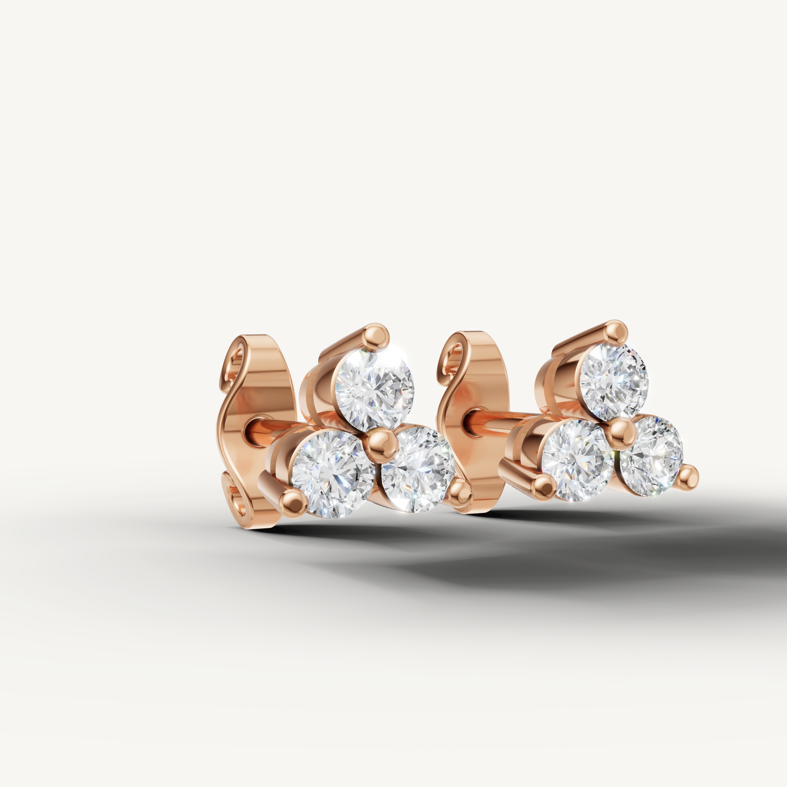Fine jewelry rose gold triple diamond stud earrings for women Raul Diamonds