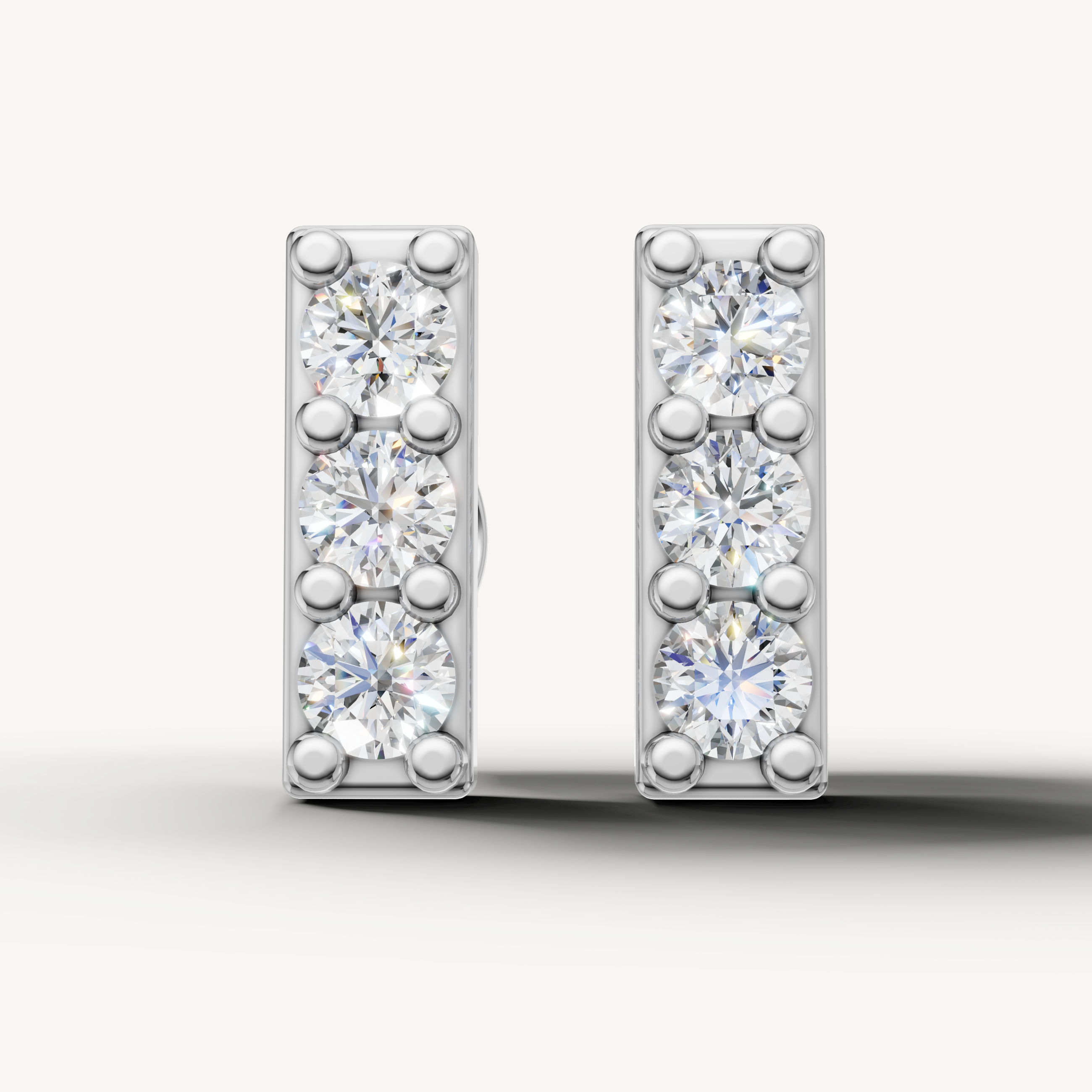 Raul Diamonds white gold three stone diamond bar earrings elegant fine jewelry