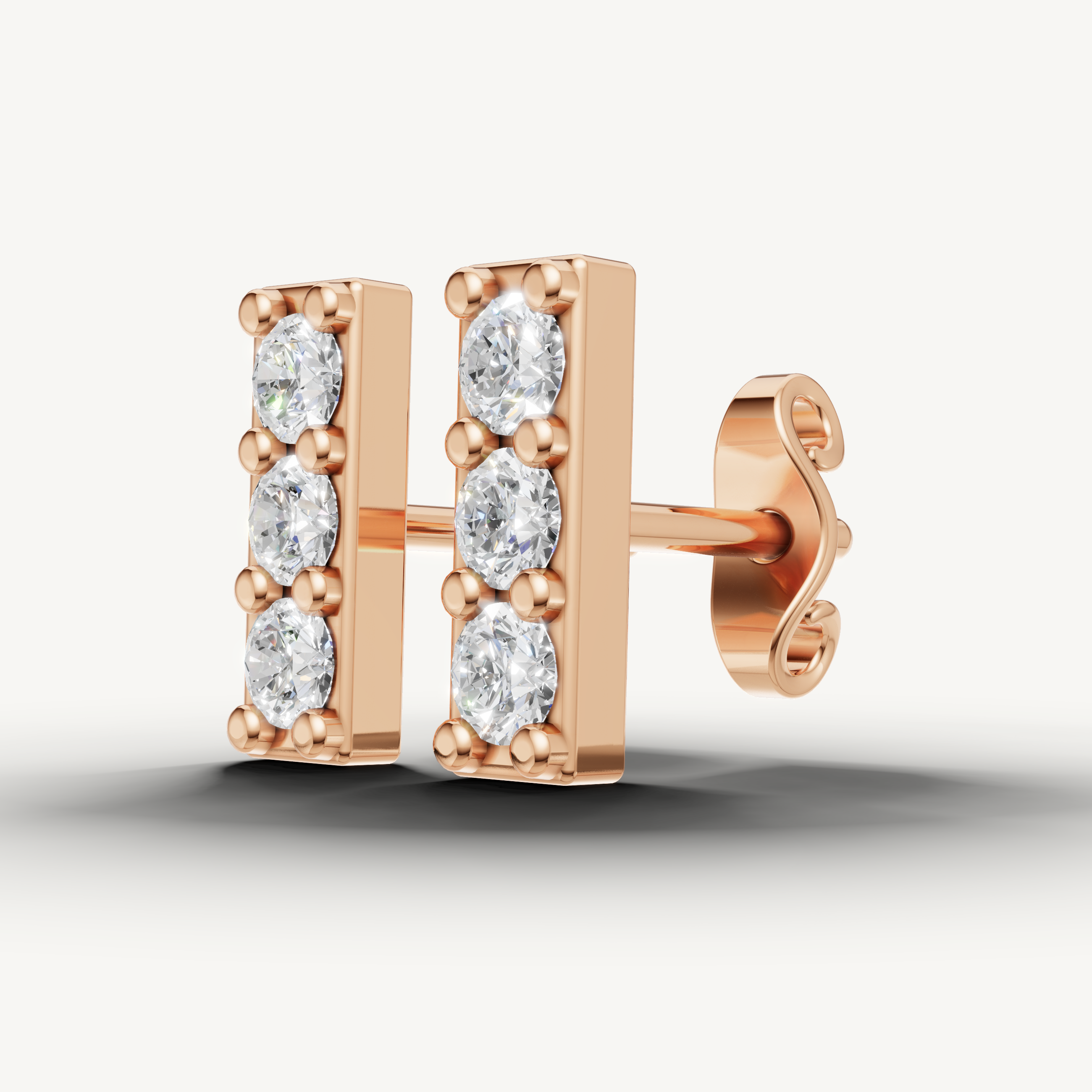 Fine jewelry rose gold triple diamond stud earrings modern design Raul Diamonds