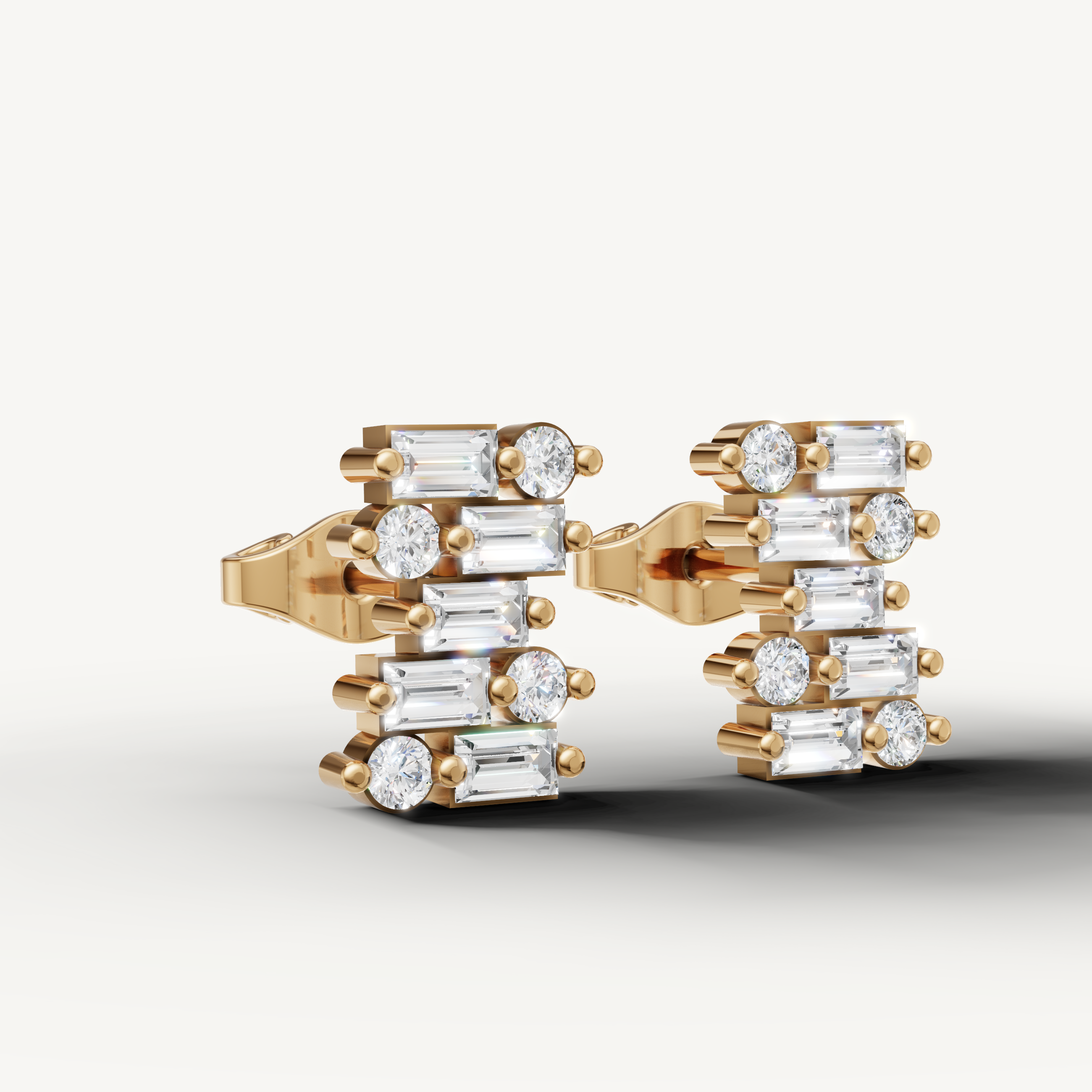 Luxury yellow gold layered baguette diamond earrings Raul Diamonds