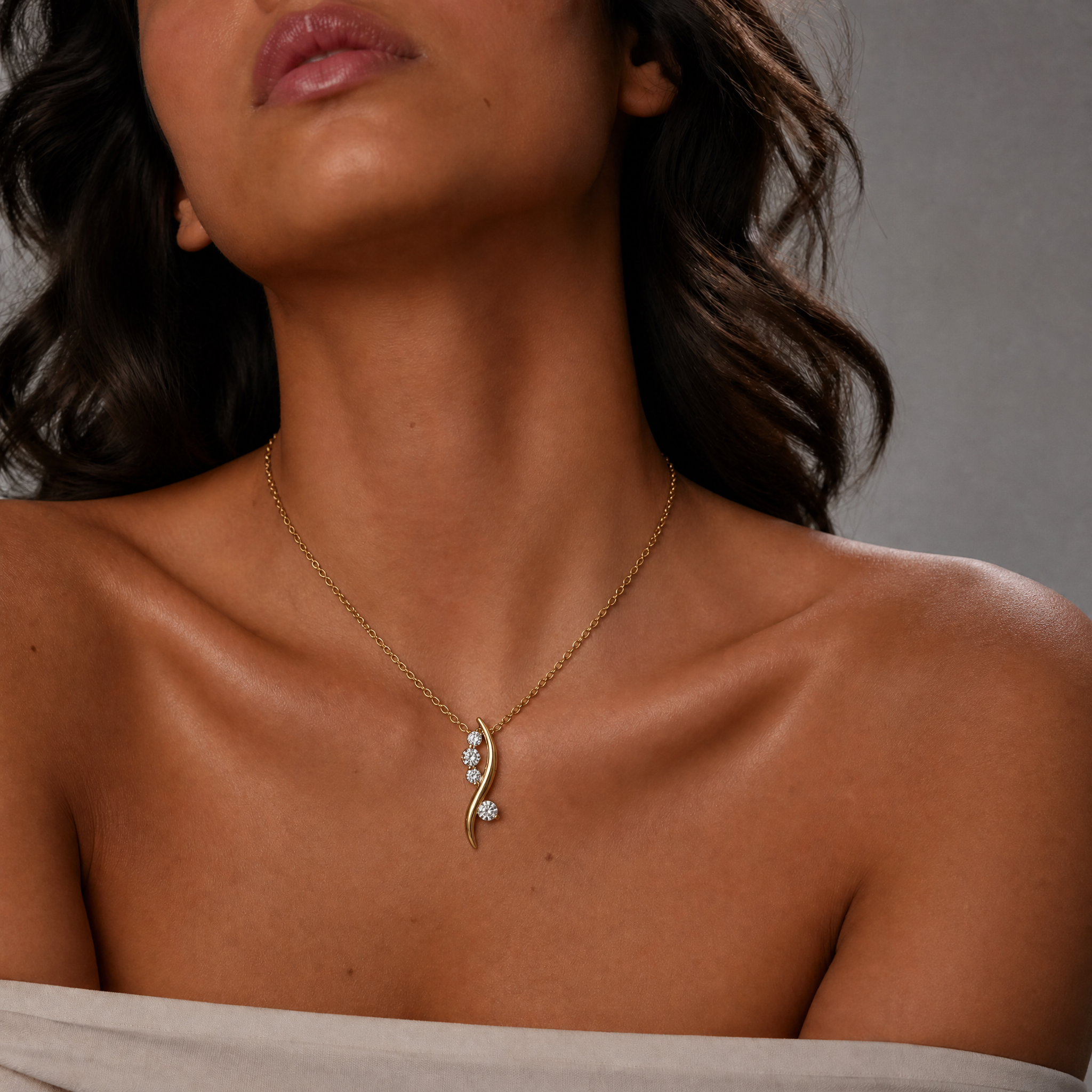 Female Model Wearing Curved Lab Grown Diamond Pendant Necklace in 14K Gold by Raul Diamonds