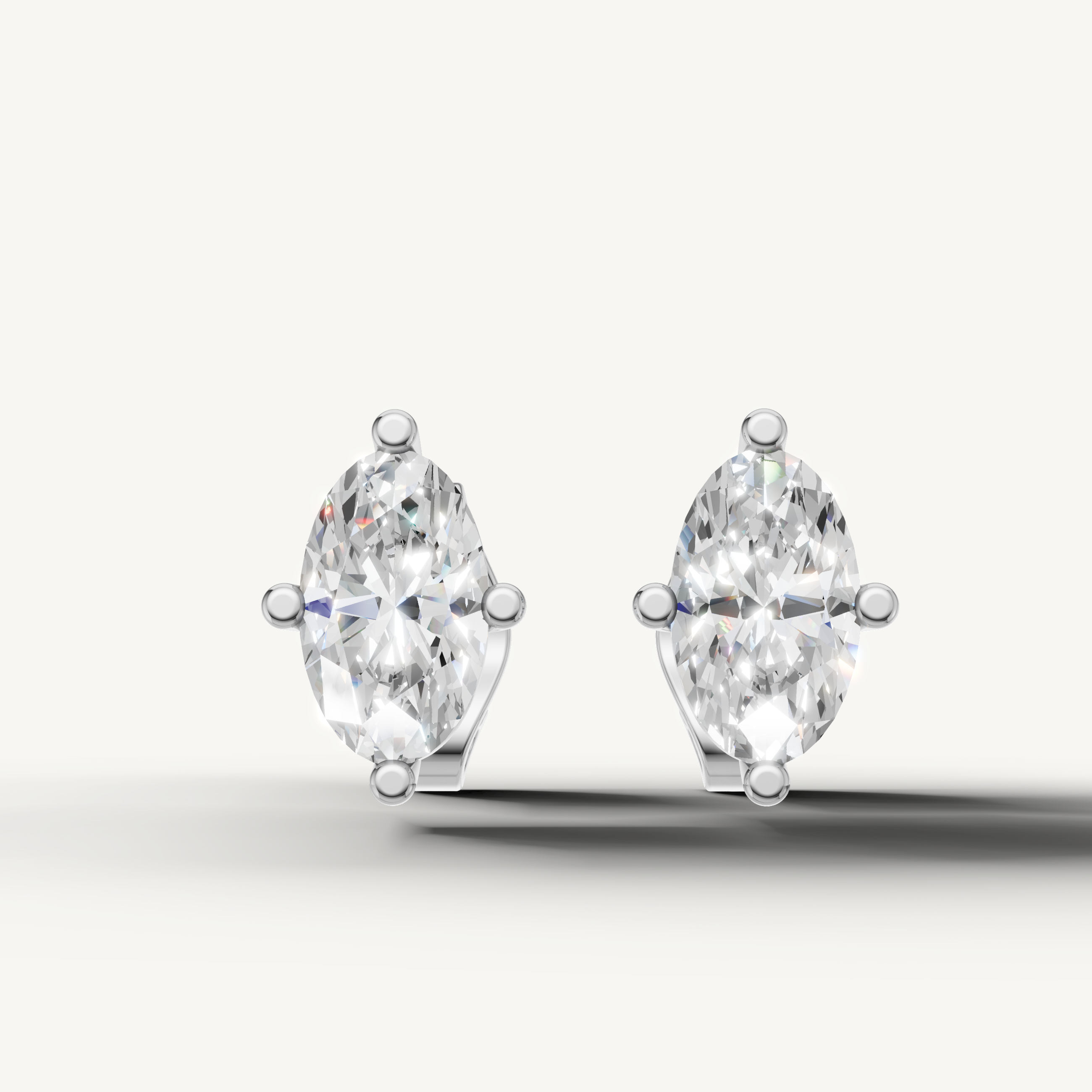 Raul Diamonds white gold marquise diamond stud earrings with sparkling solitaire luxury design