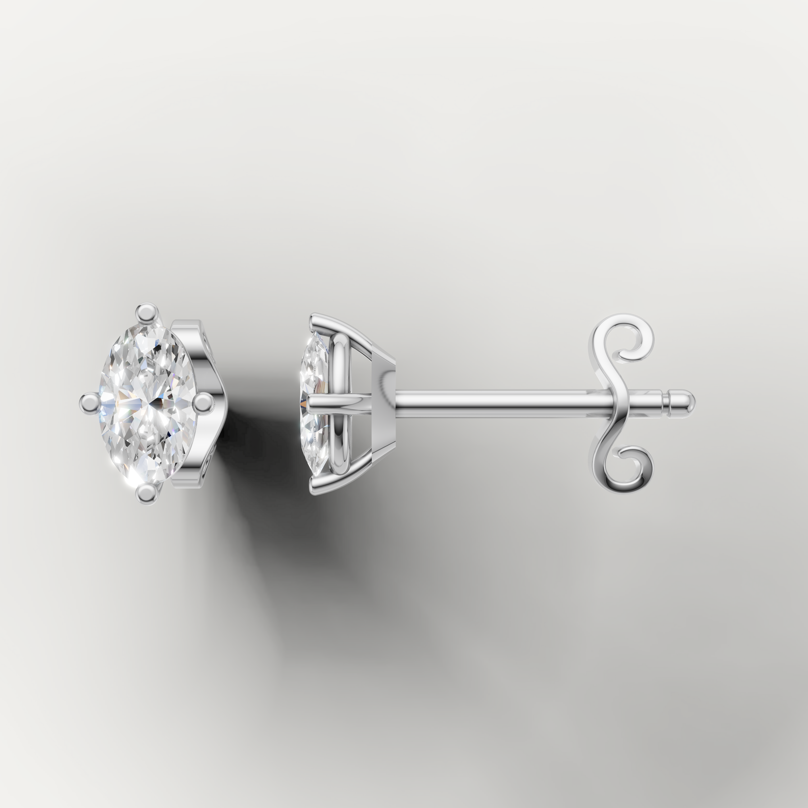 White gold marquise cut diamond earrings by Raul Diamonds featuring elegant fine jewelry craftsmanship