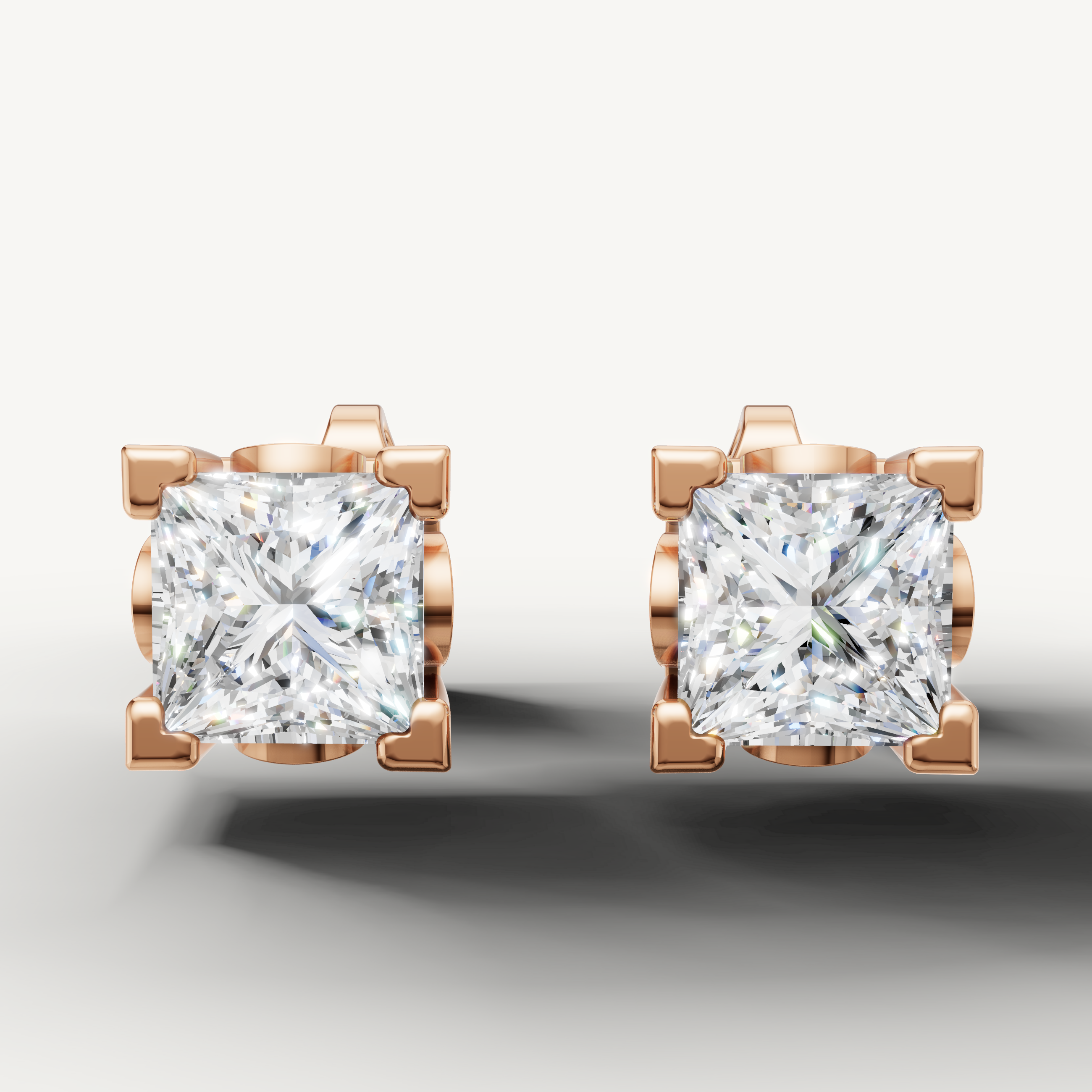 Princess cut lab grown diamond stud earrings in 14K rose gold by Raul Diamonds