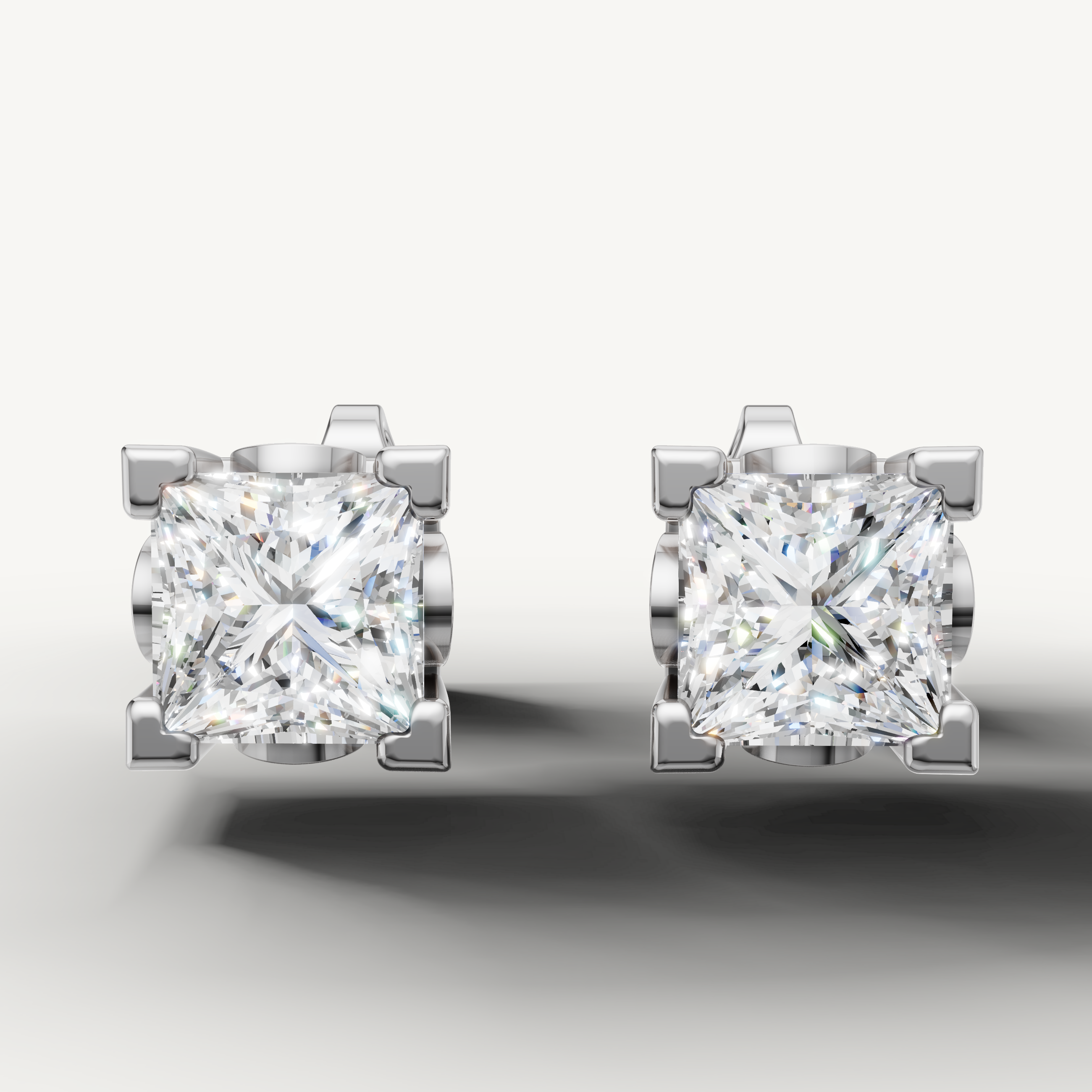 Princess cut lab grown diamond stud earrings in 14K white gold by Raul Diamonds