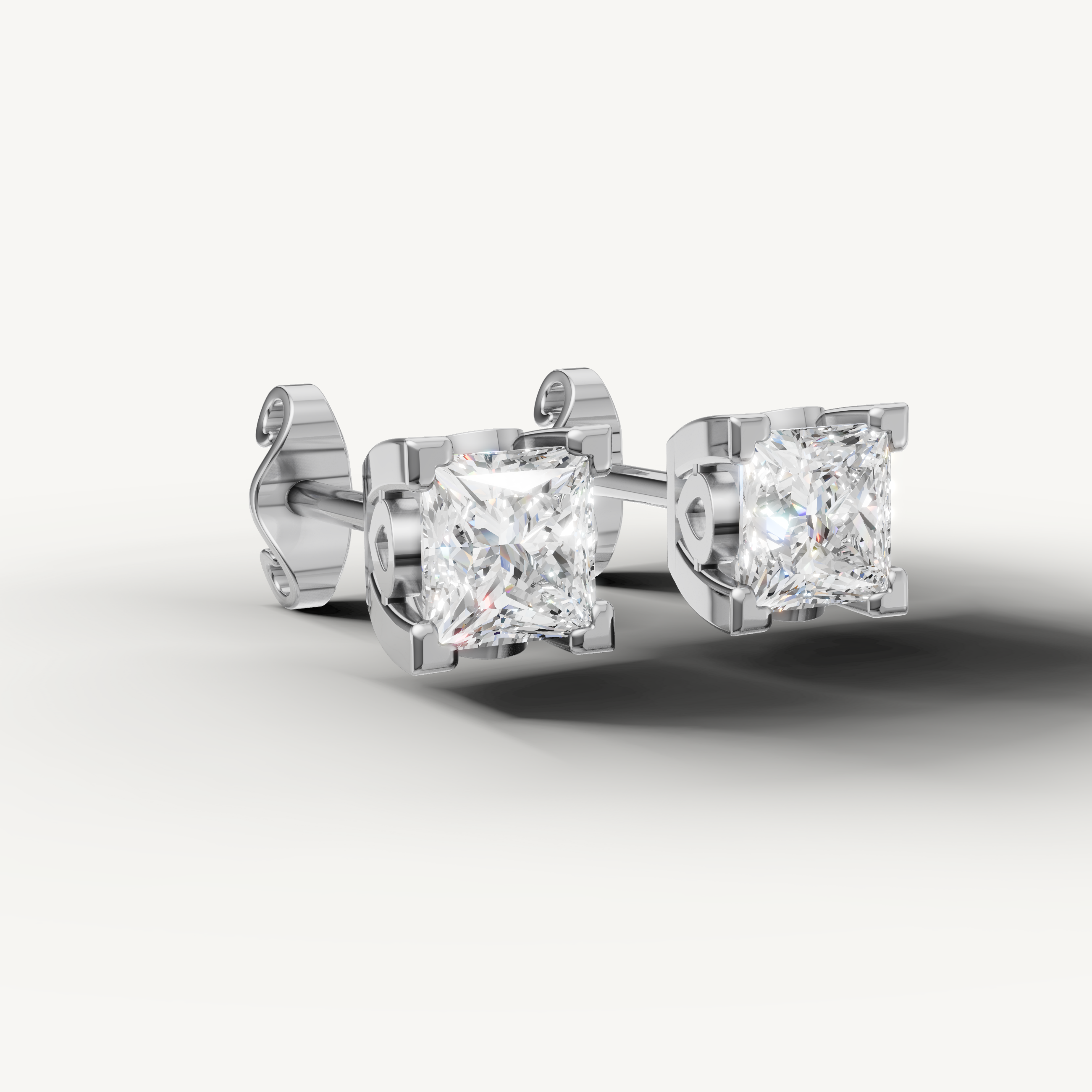 Luxury white gold solitaire earrings for women with sparkling princess diamonds by Raul Diamonds