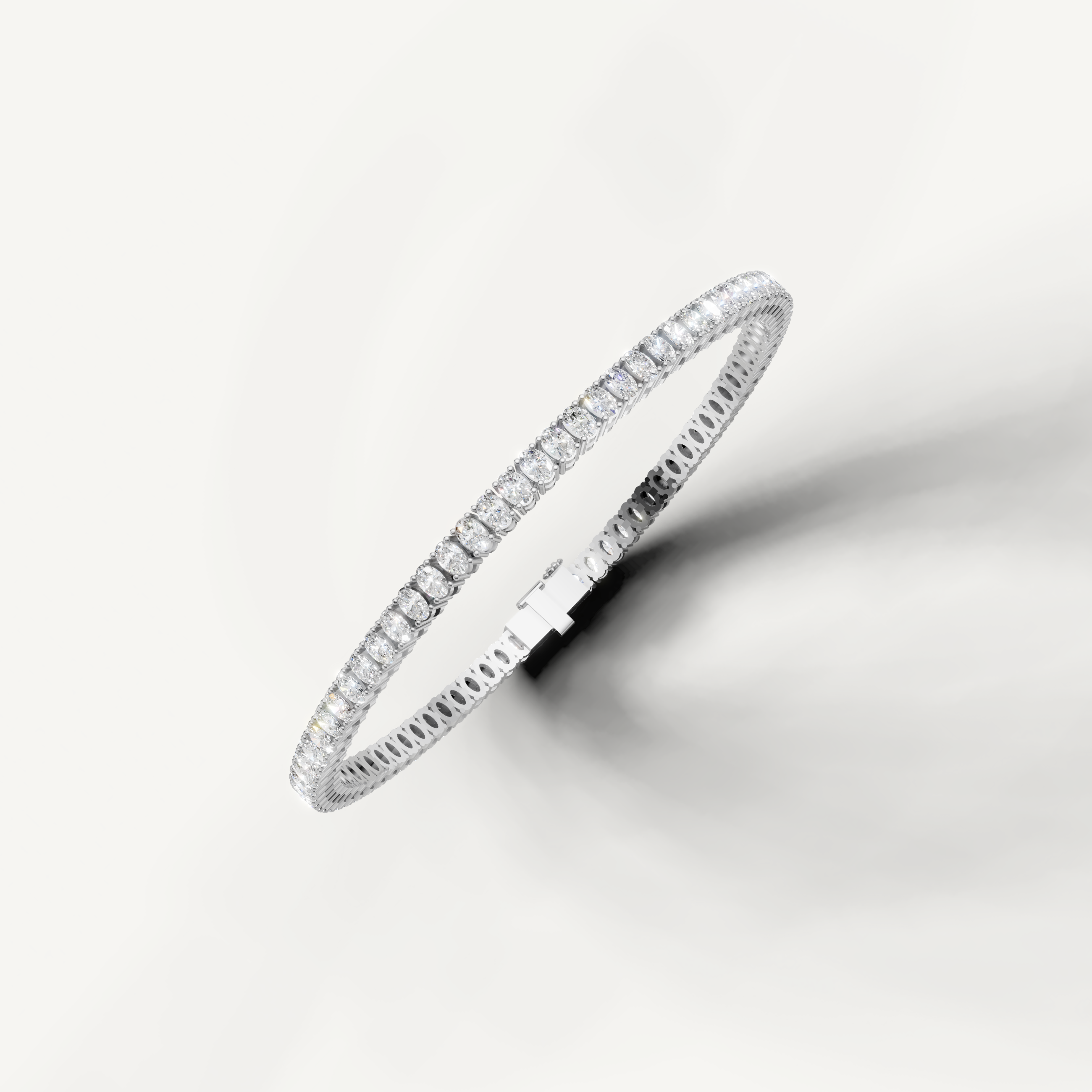 White gold oval diamond tennis bracelet for women by Raul Diamonds