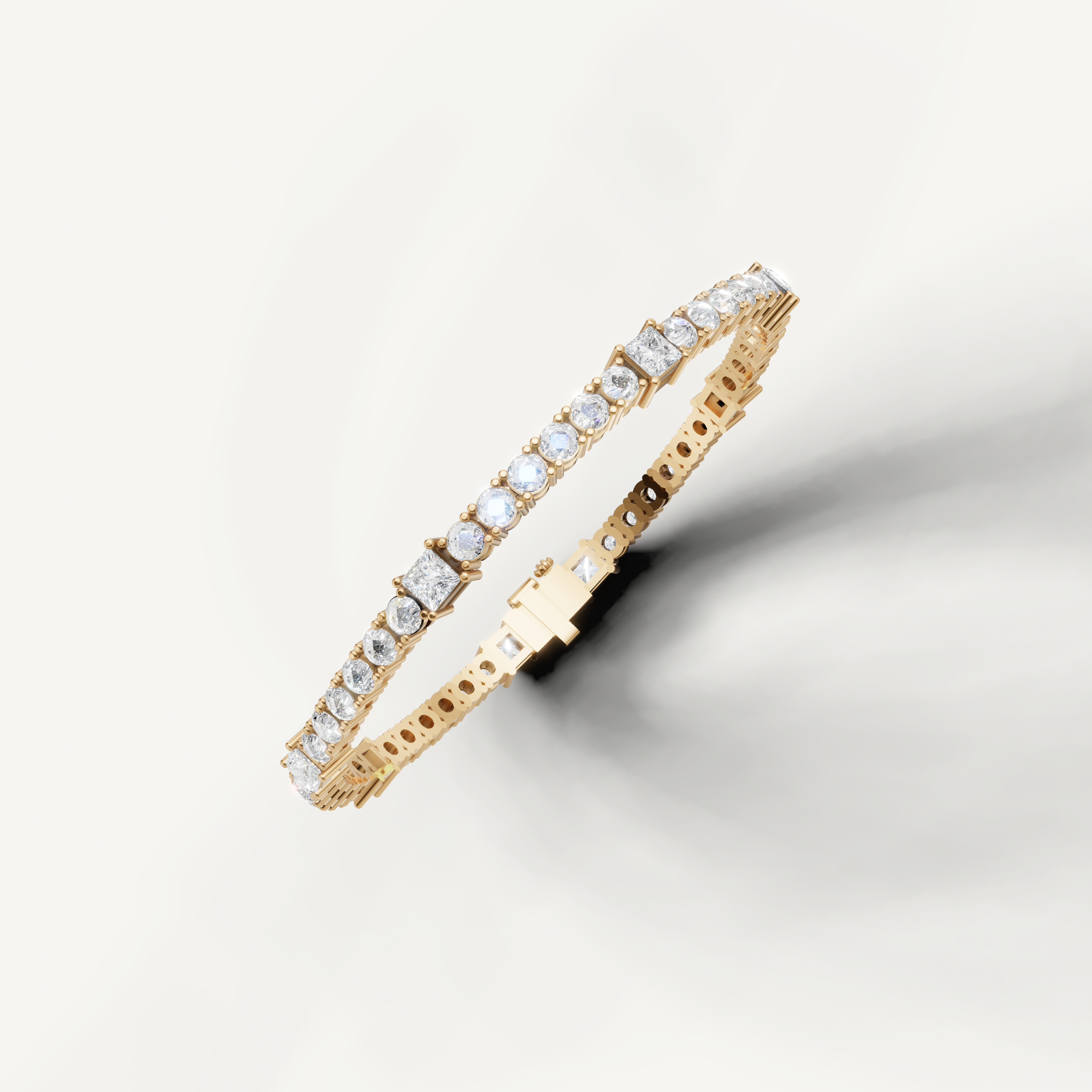 Yellow gold diamond tennis bracelet with mixed diamond shapes by Raul Diamonds