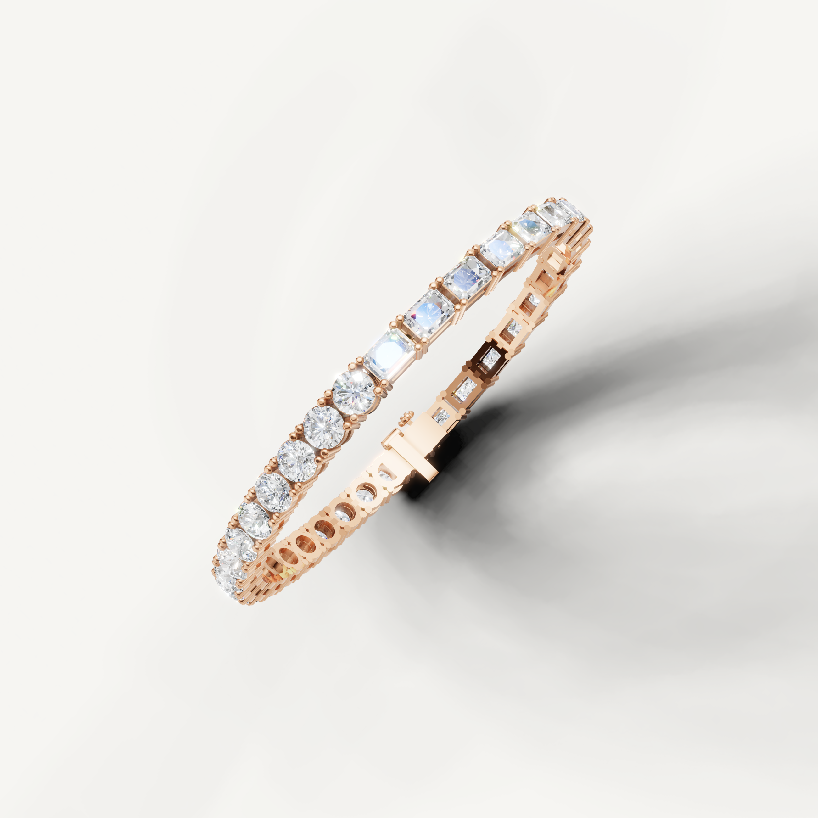 Rose gold diamond bracelet by Raul Diamonds featuring modern round and radiant cut stones