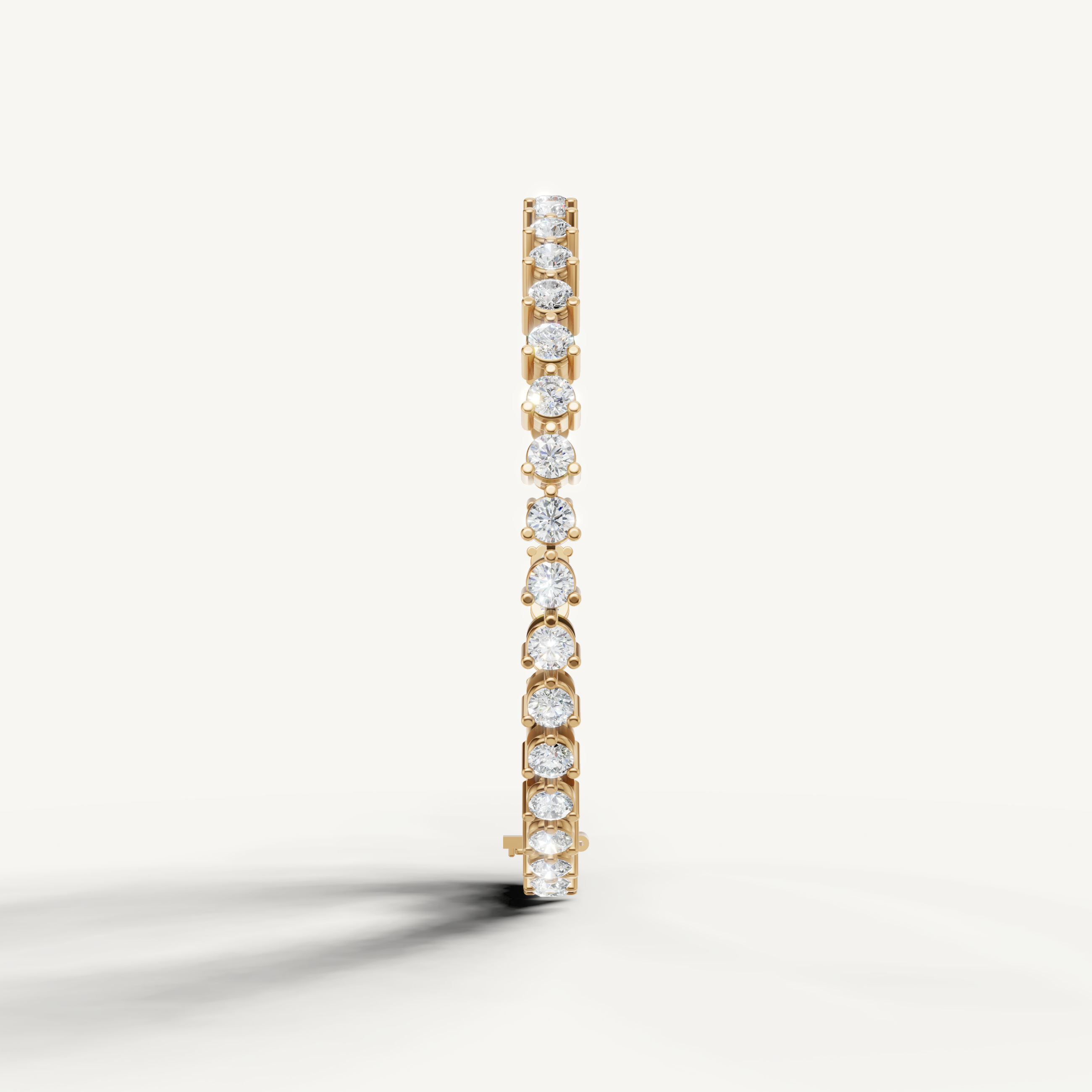 Luxury yellow gold diamond bracelet with alternating pear and round cut diamonds