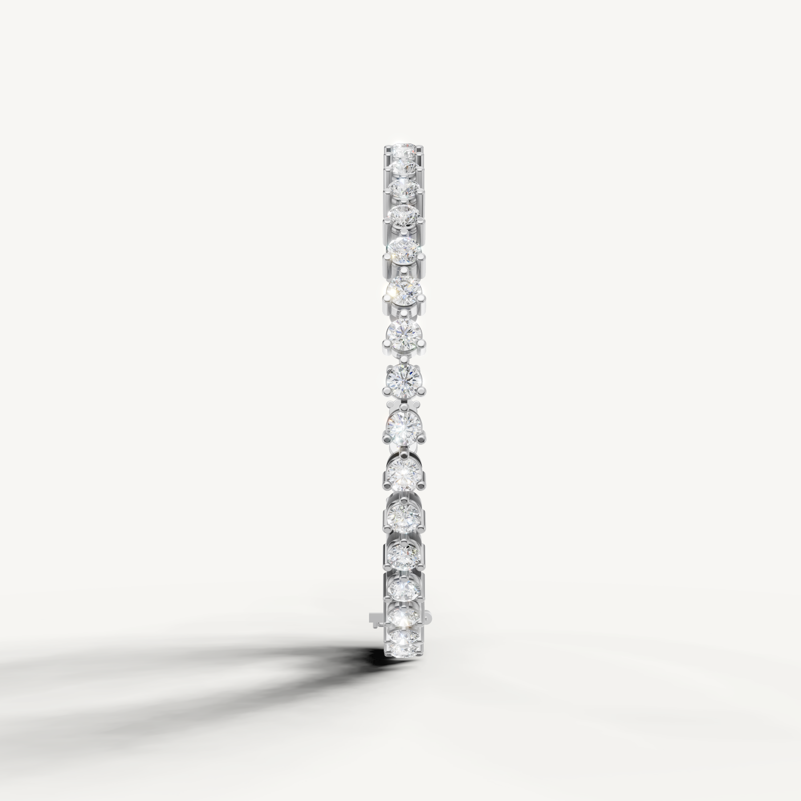 Elegant white gold bracelet with alternating pear shape and round diamonds