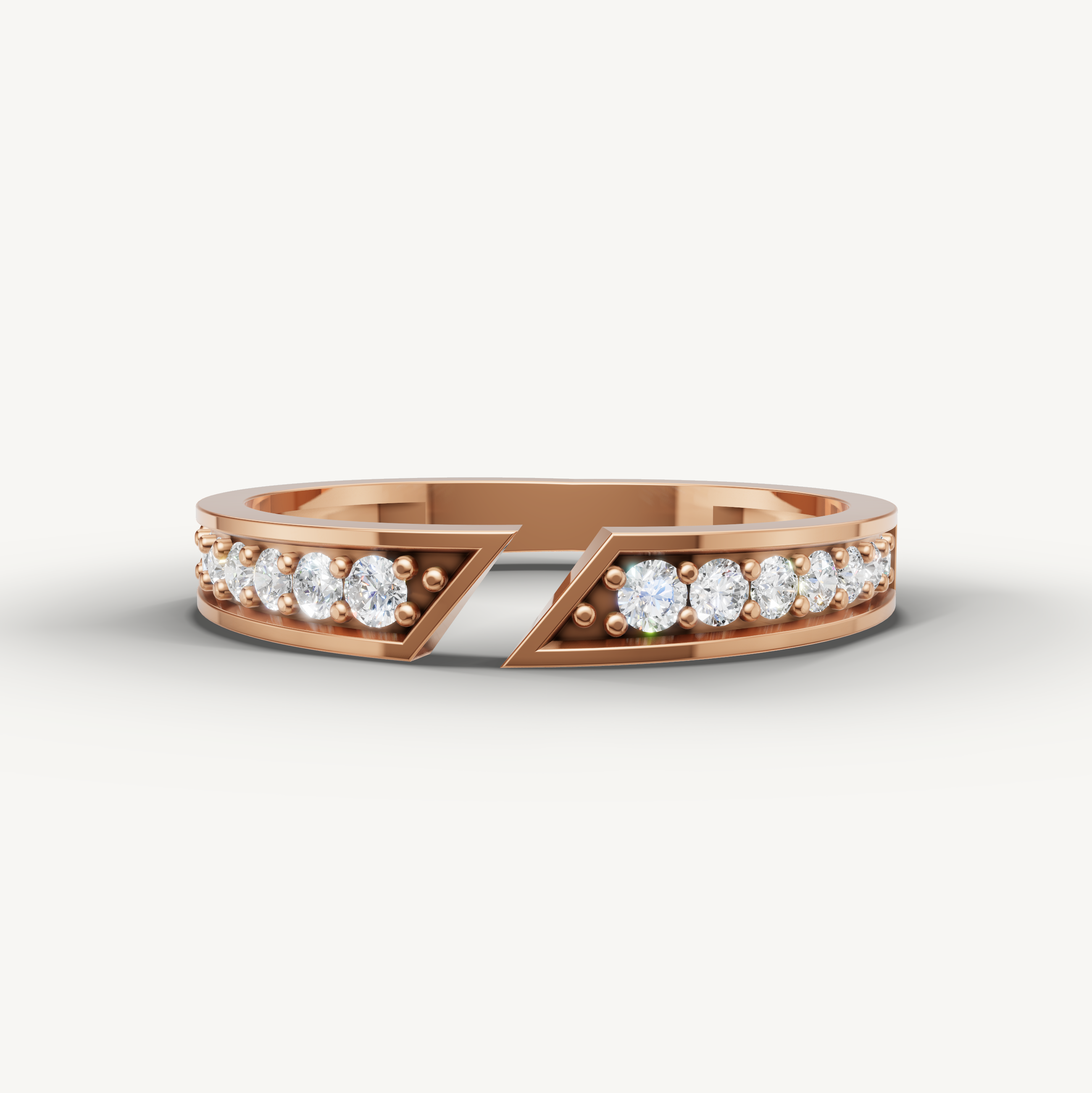 Rose gold geometric wedding ring featuring pavé round diamonds and modern split design