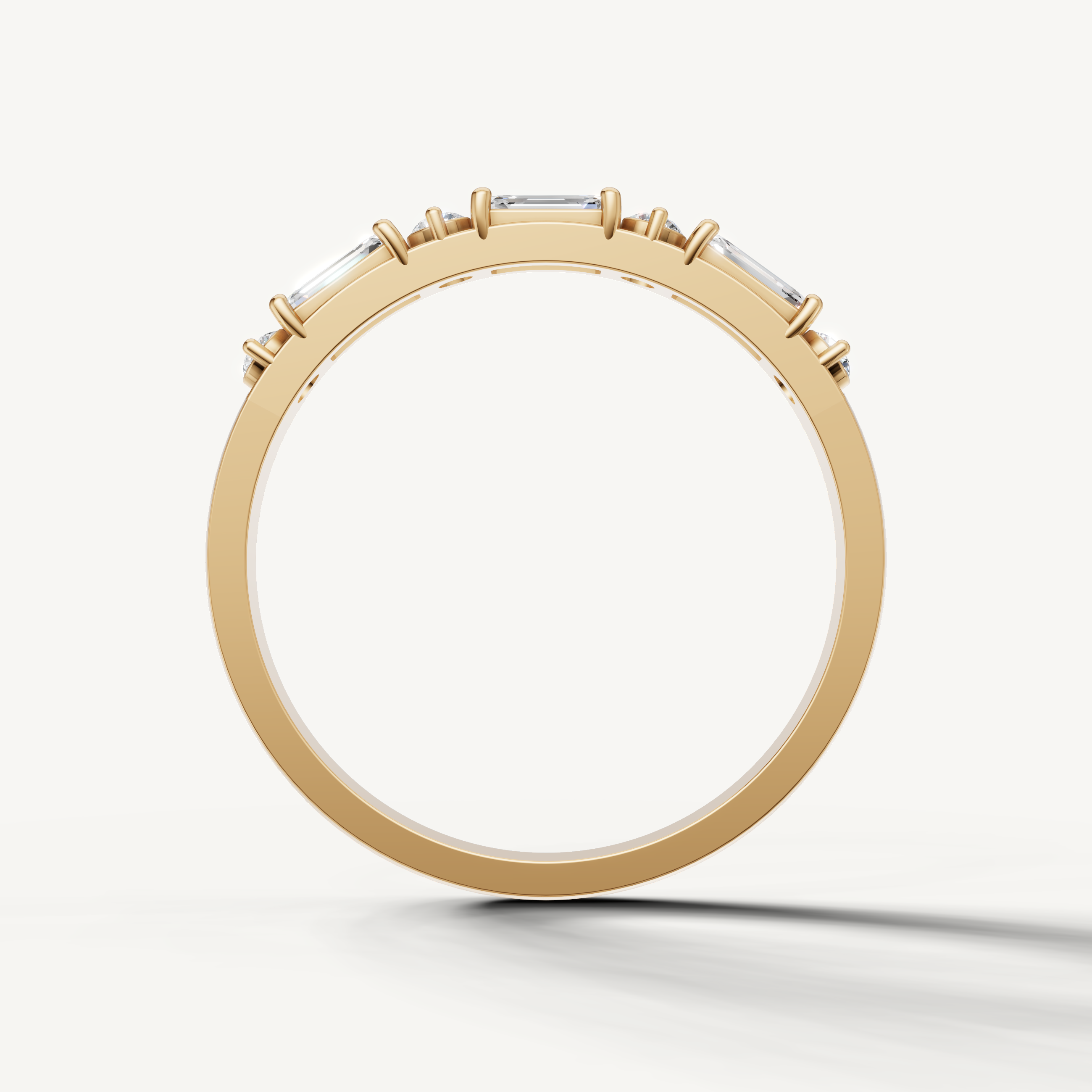 Luxury yellow gold stackable diamond wedding band with modern emerald cut design