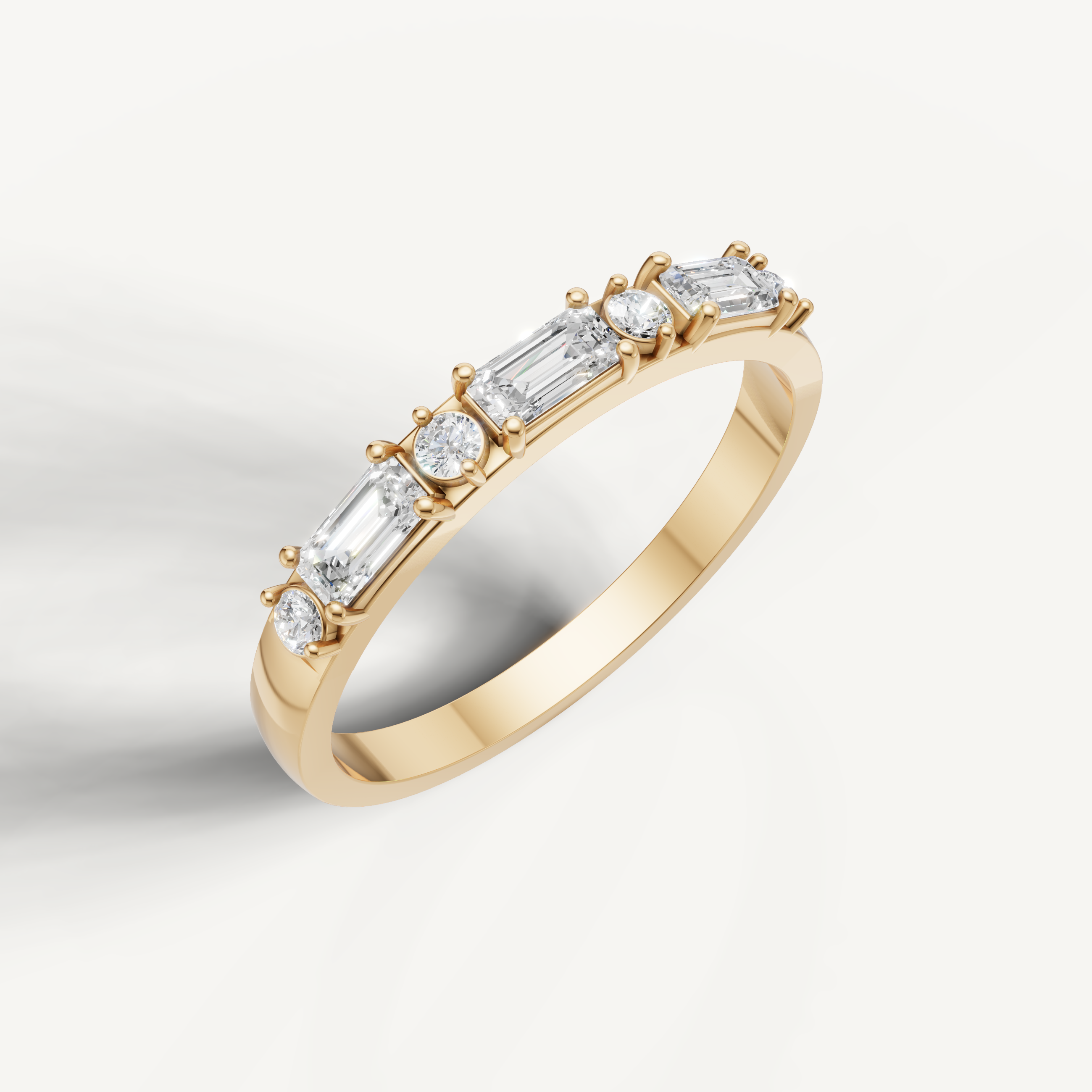 Elegant yellow gold baguette and round cut diamond anniversary wedding band by Raul Diamonds