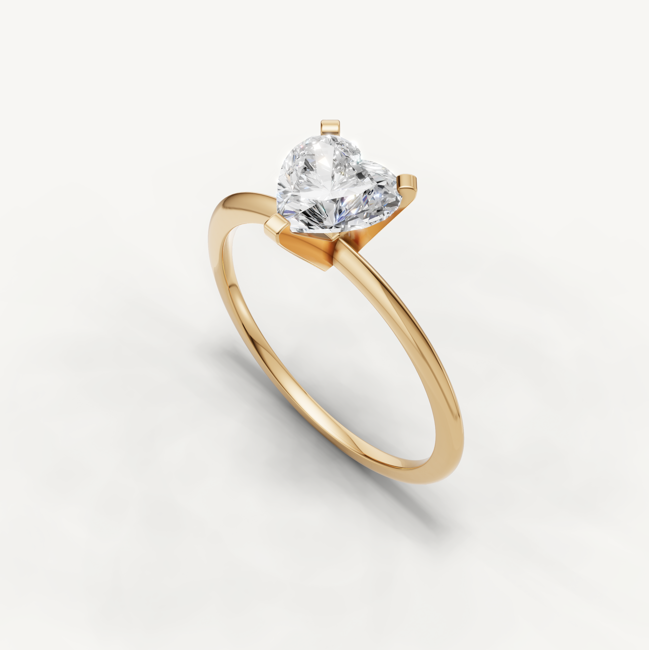 Minimal yellow gold heart cut engagement ring with lab grown diamond by Raul Diamonds